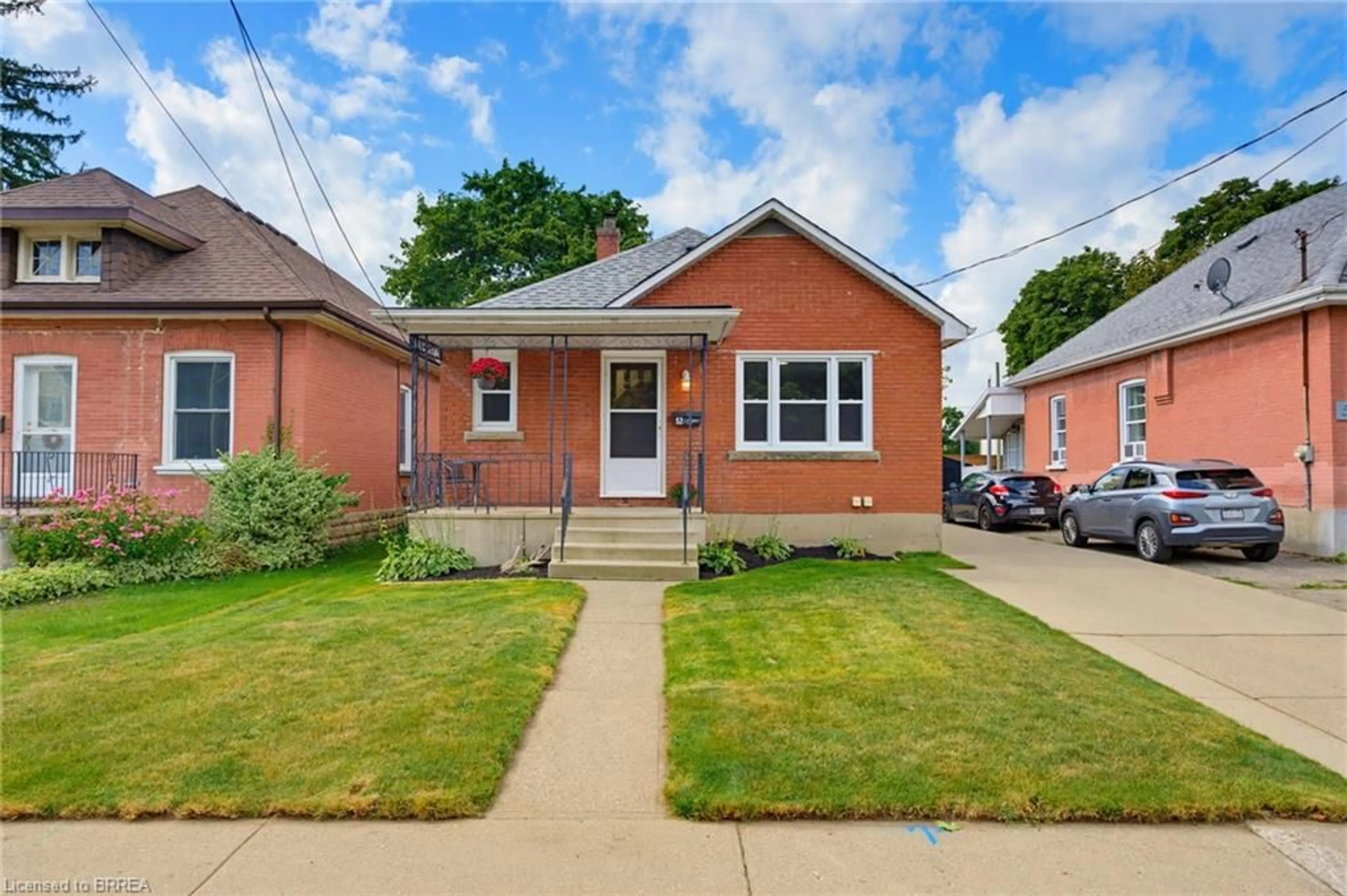 Home with brick exterior material, street for 52 Burwell St, Brantford Ontario N3T 4T7