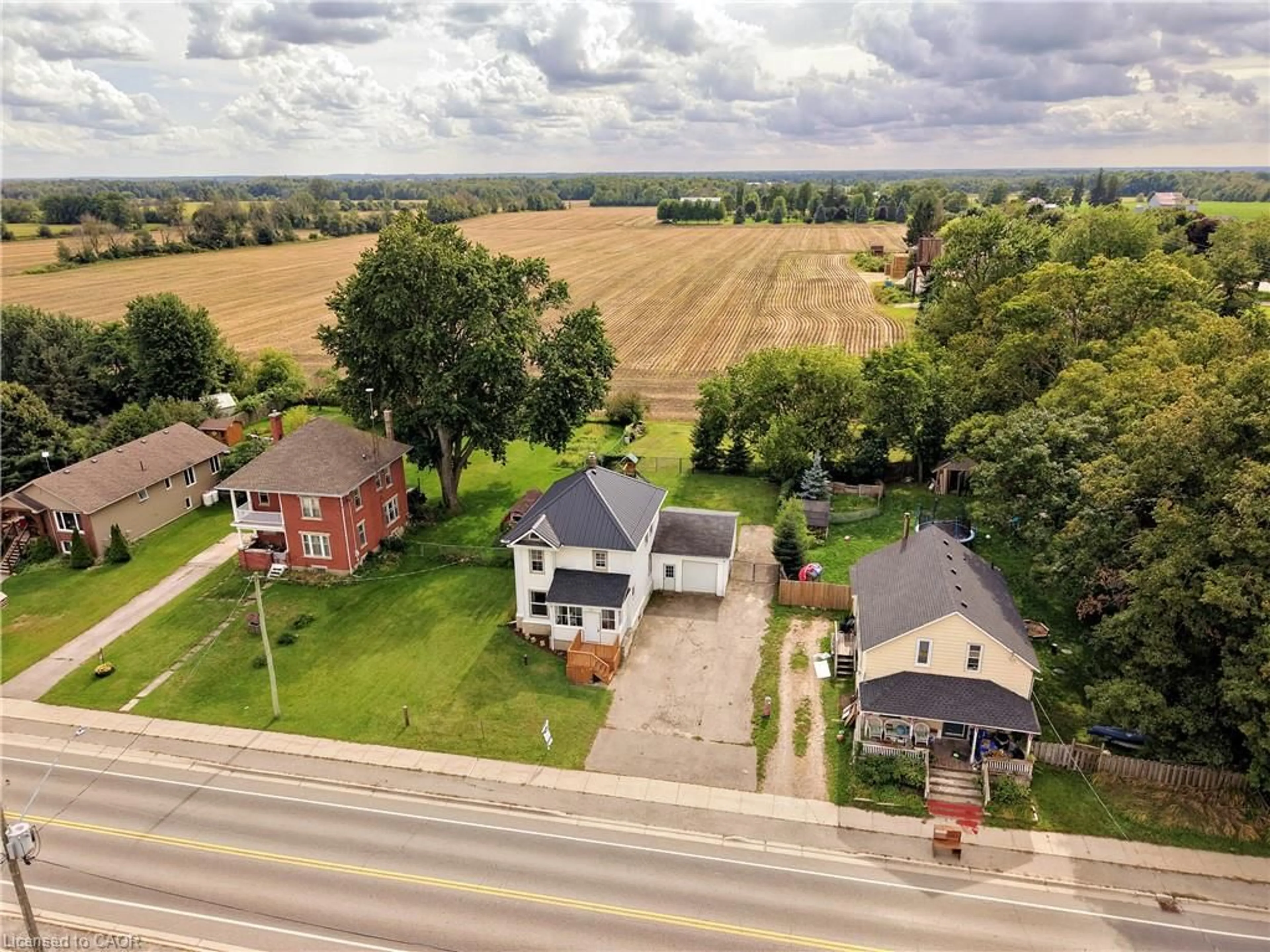 A pic from outside/outdoor area/front of a property/back of a property/a pic from drone, street for 9116 Highway #6, Kenilworth Ontario N0E 2E0