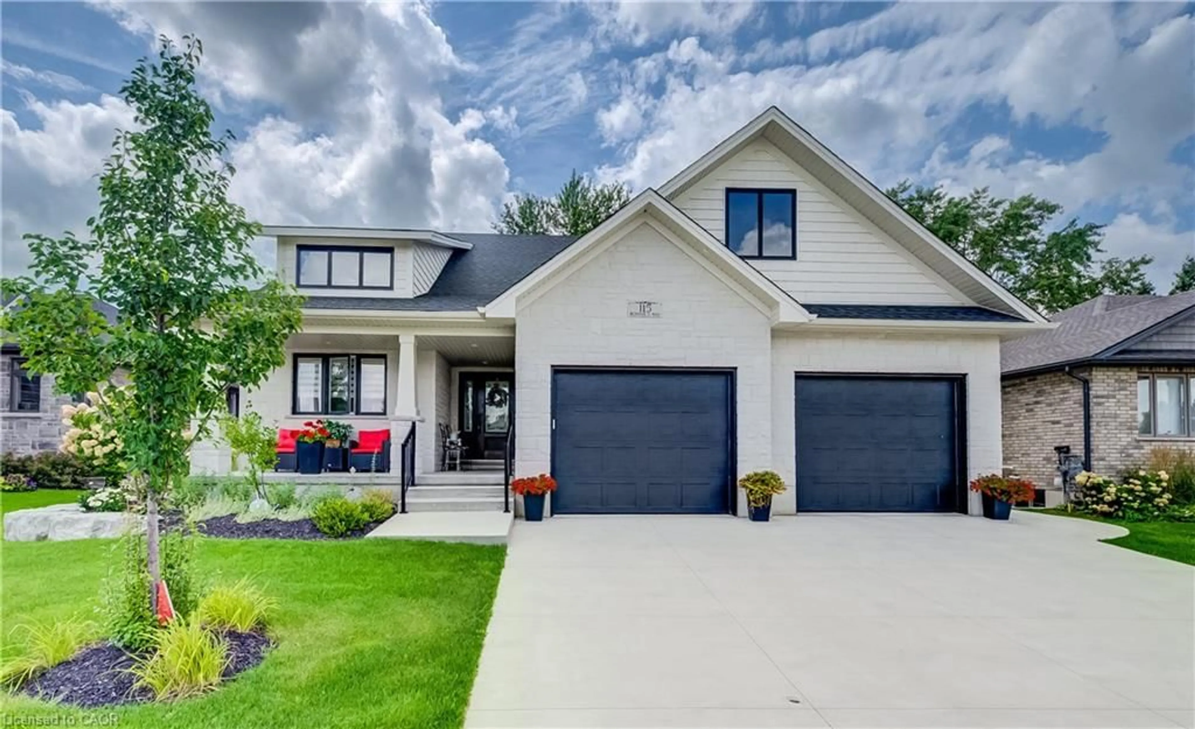 Home with vinyl exterior material, street for 115 Ronnies Way, Mount Forest Ontario N0G 2L2