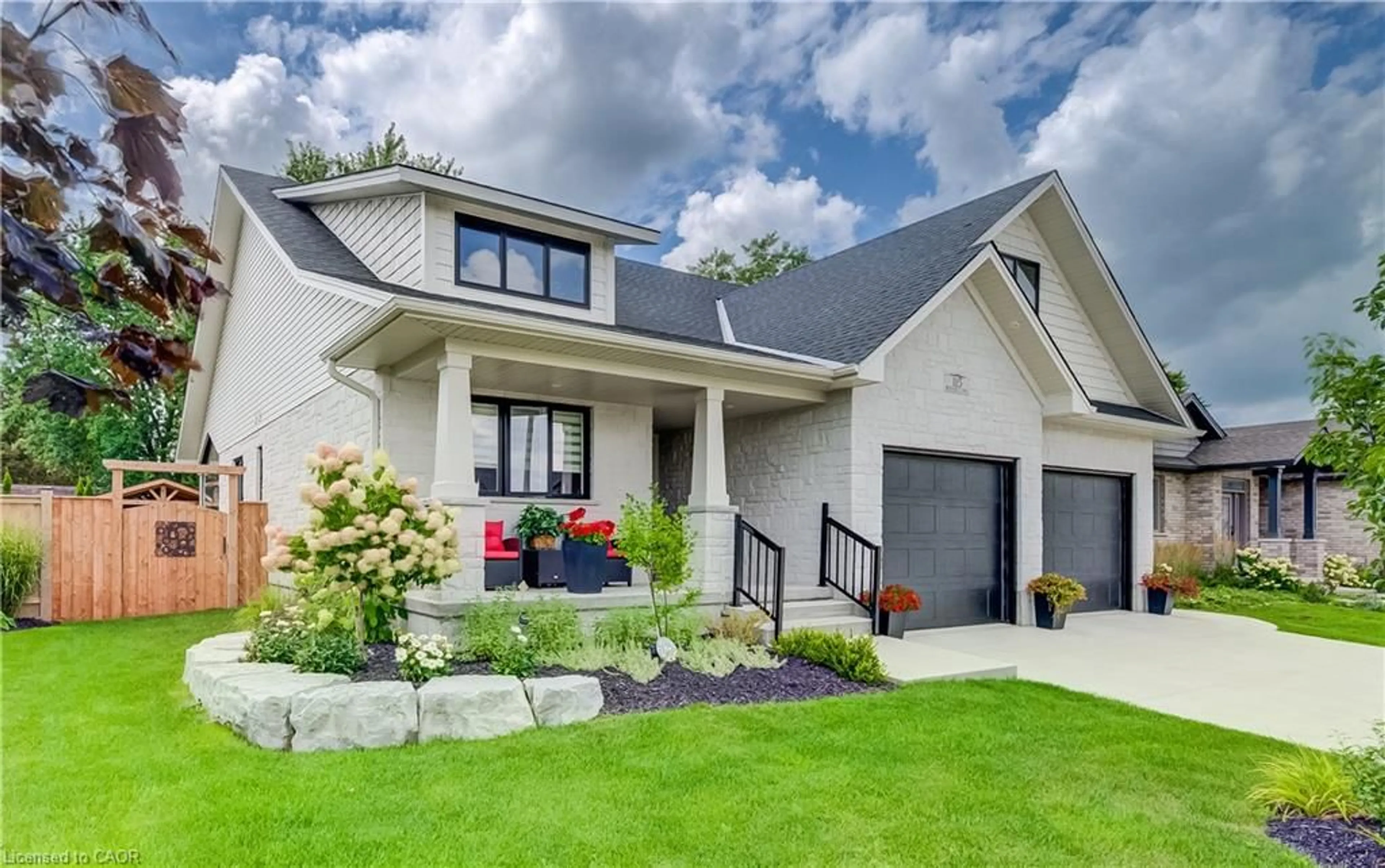Home with brick exterior material, street for 115 Ronnies Way, Mount Forest Ontario N0G 2L2