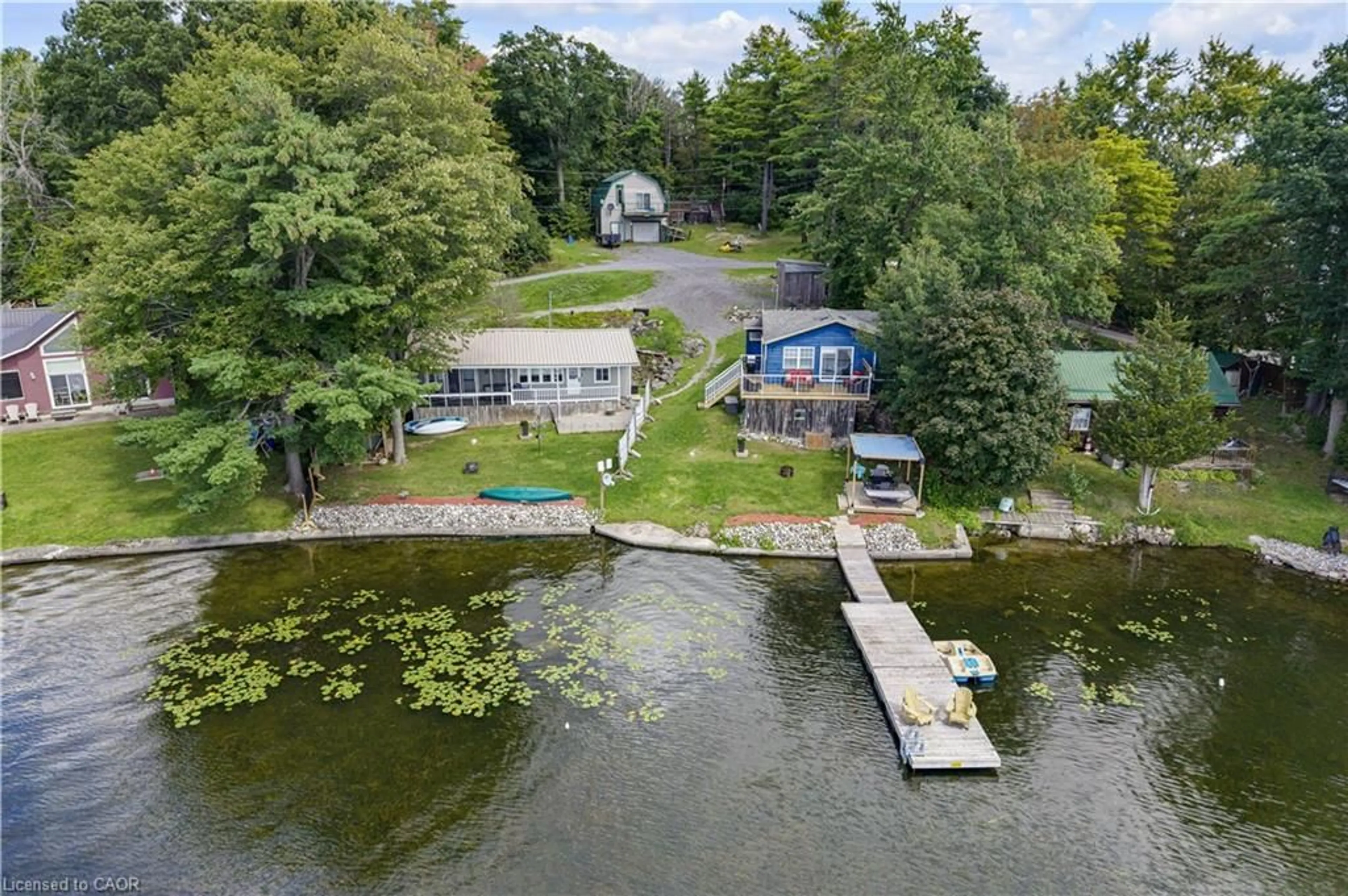 A pic from outside/outdoor area/front of a property/back of a property/a pic from drone, water/lake/river/ocean view for 805 Cartwrights Lane, Seeleys Bay Ontario K0H 2N0
