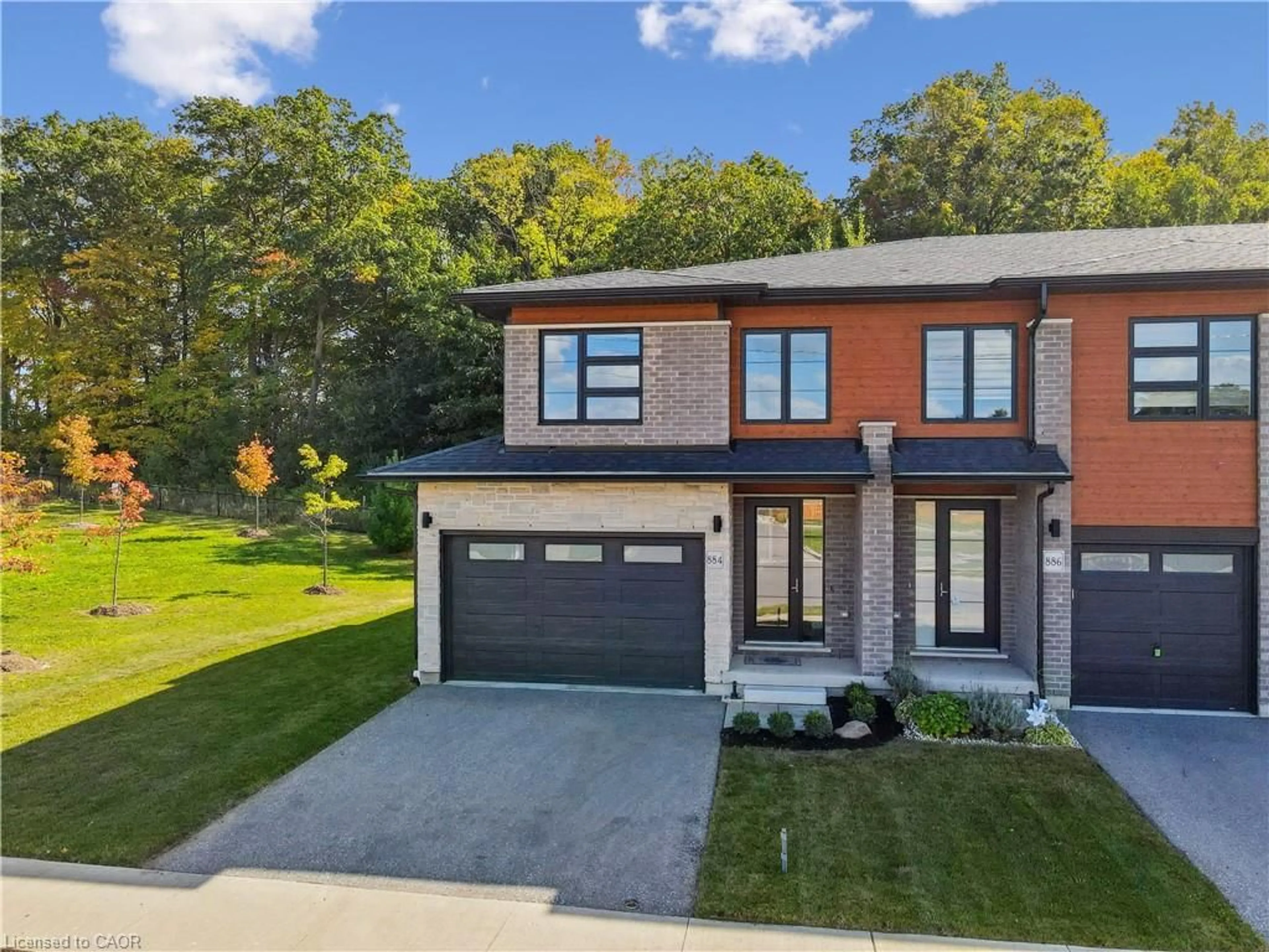 Home with brick exterior material, street for 884 Robert Ferrie Dr, Kitchener Ontario N2R 0P2