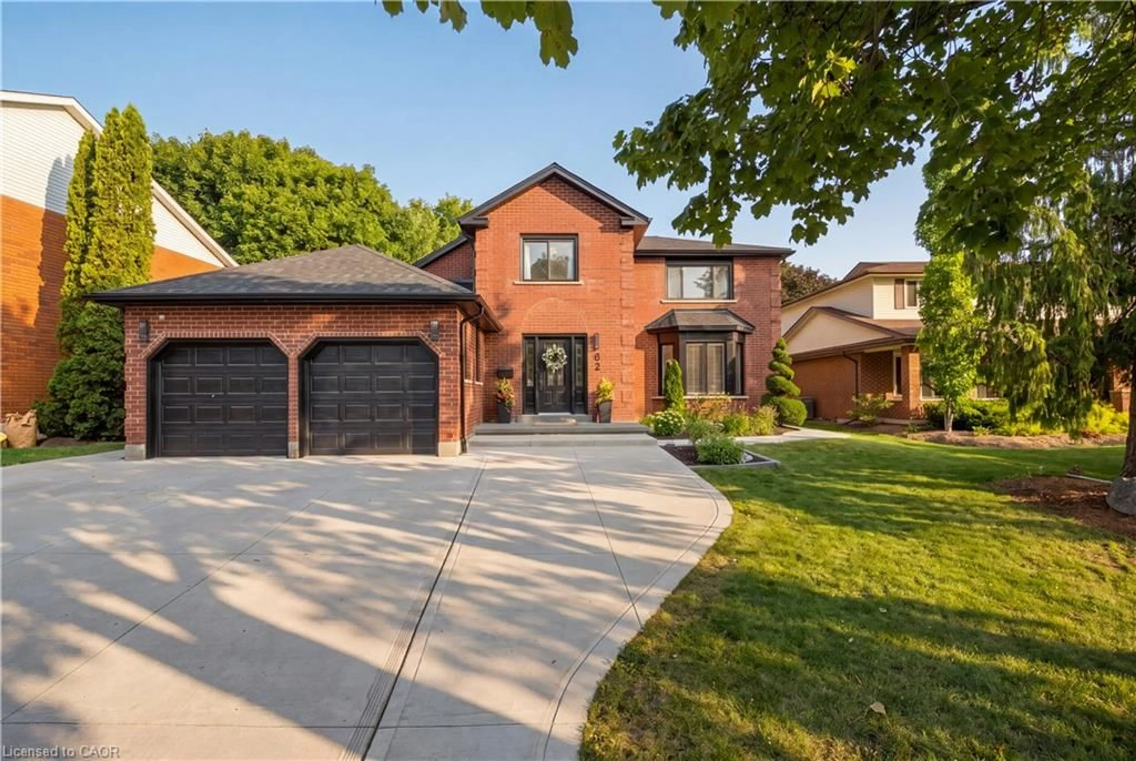 Home with brick exterior material, street for 62 Corfield Dr, Kitchener Ontario N2A 3W9