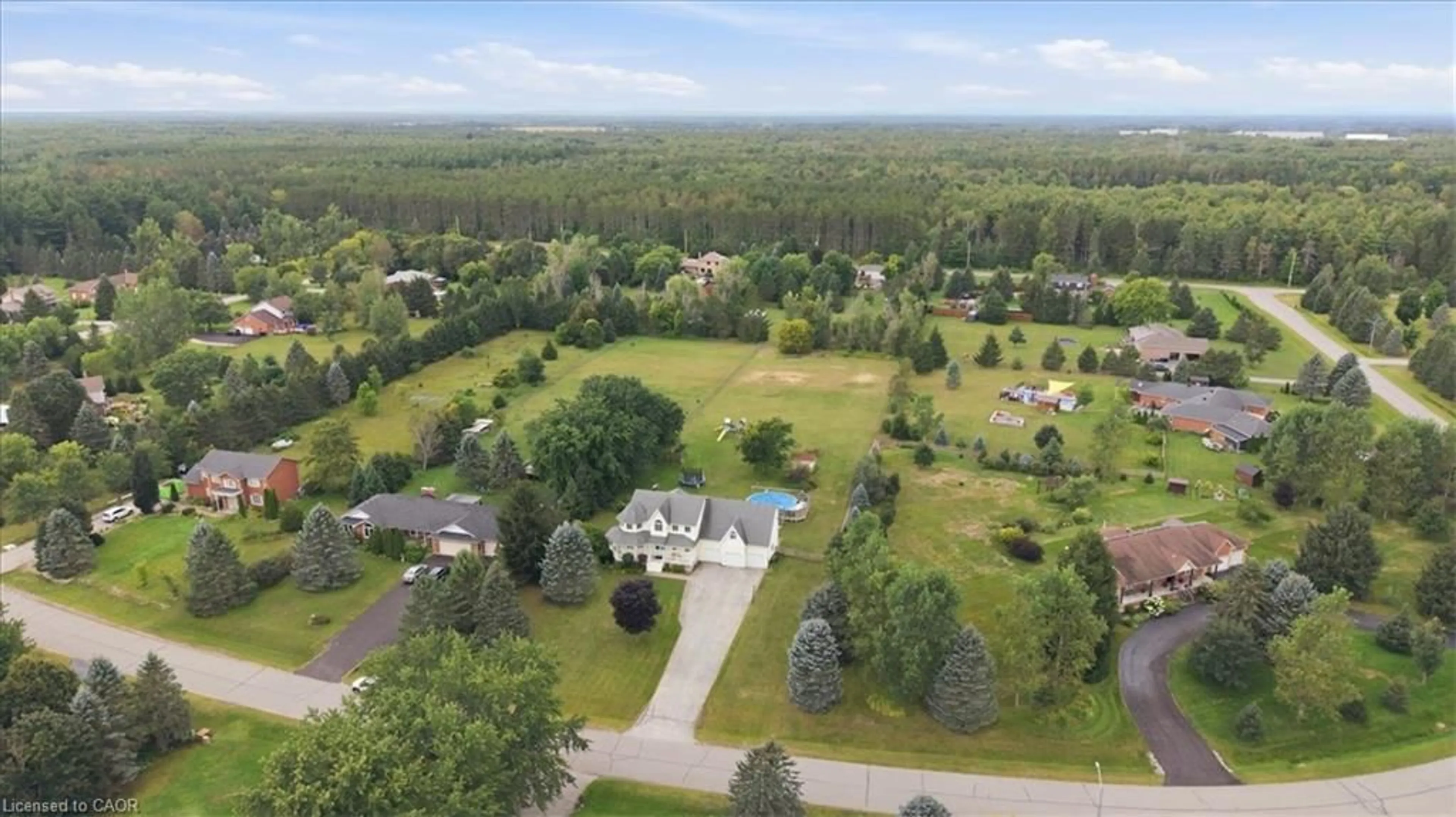 A pic from outside/outdoor area/front of a property/back of a property/a pic from drone, unknown for 20 Pineview Trail, Utopia Ontario L0M 1T0