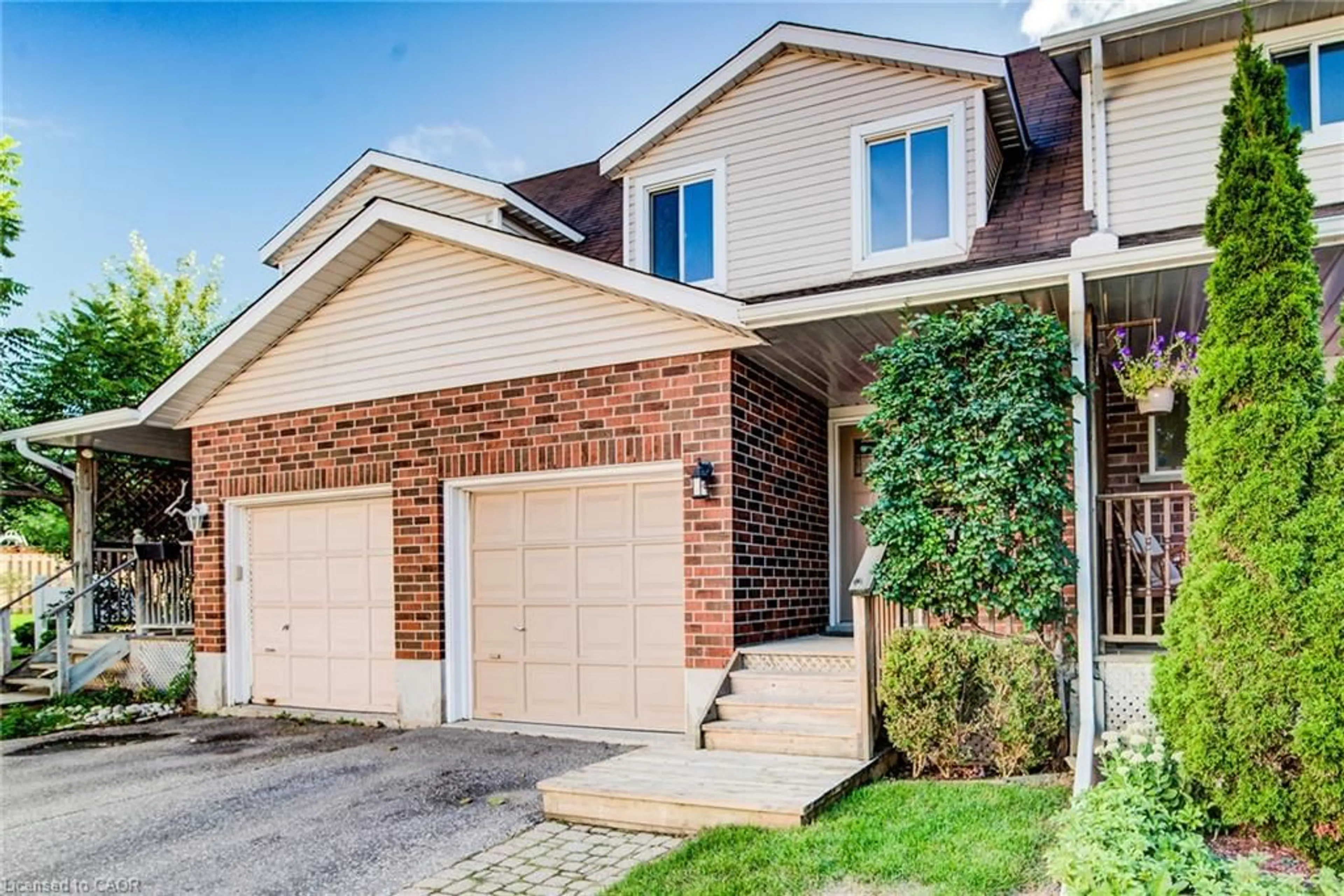 Home with brick exterior material, street for 360 Cornridge Pl #2, Waterloo Ontario N2T 2N9
