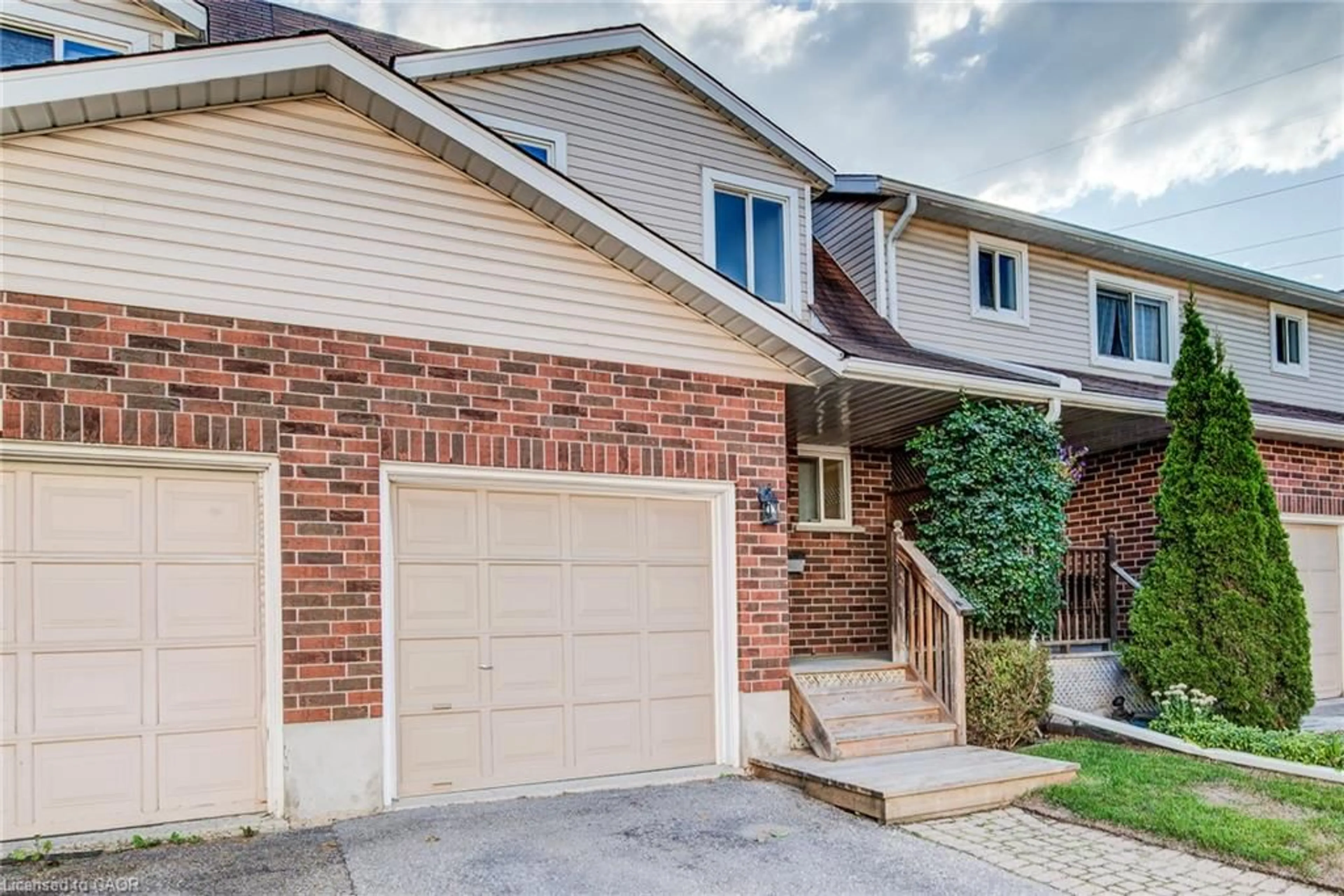 Home with brick exterior material, street for 360 Cornridge Pl #2, Waterloo Ontario N2T 2N9