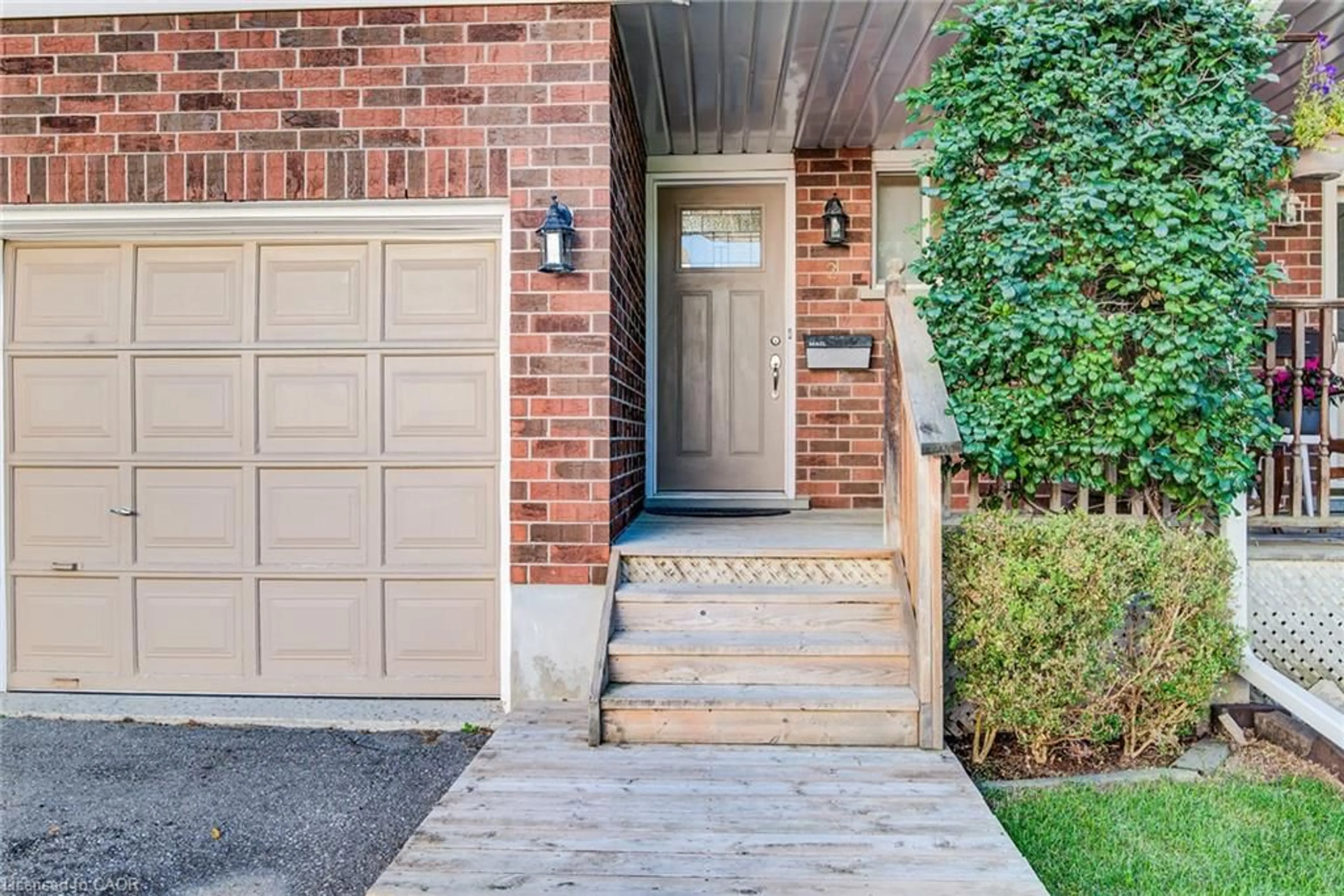Home with brick exterior material, street for 360 Cornridge Pl #2, Waterloo Ontario N2T 2N9