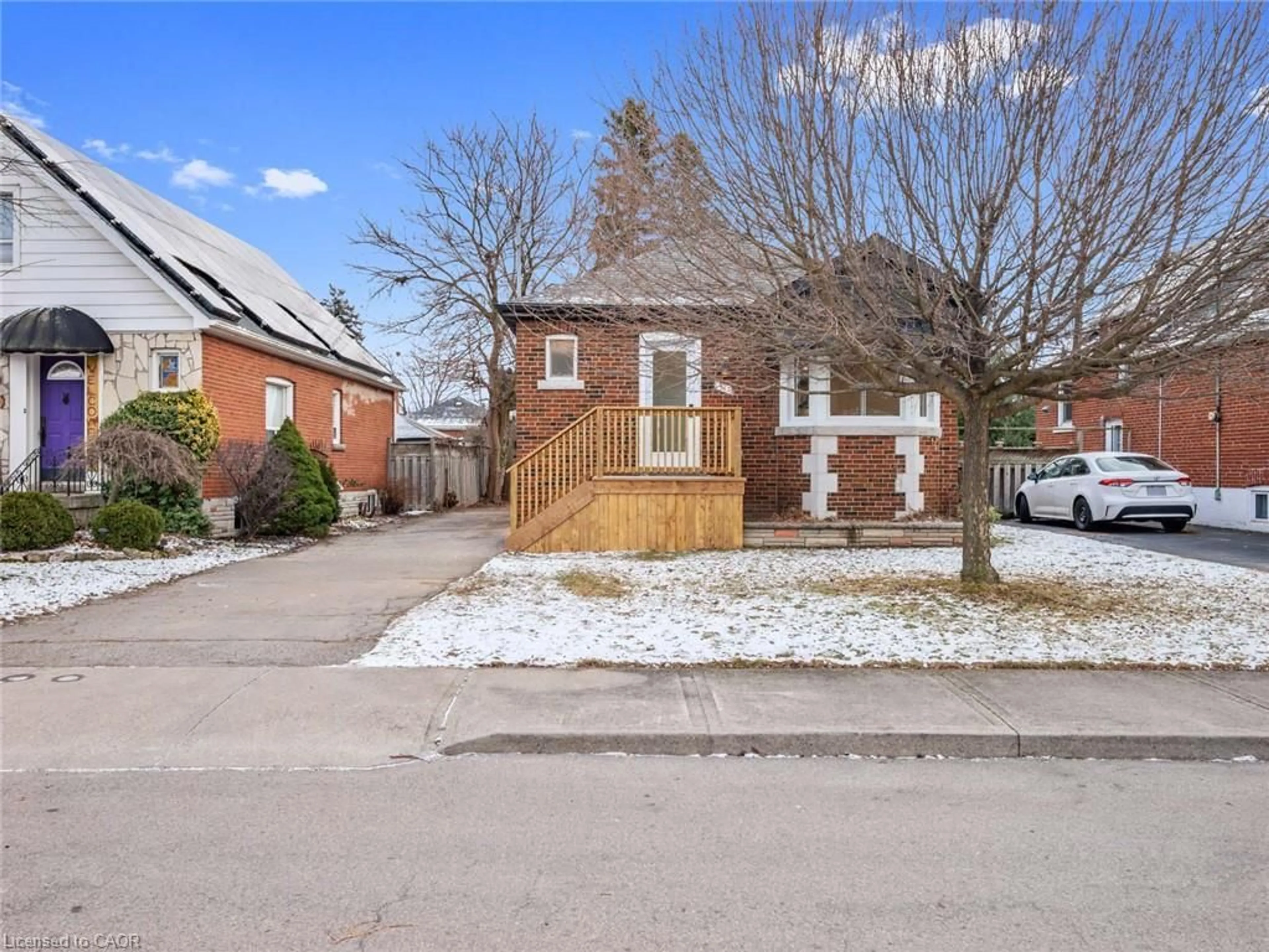 Home with brick exterior material, street for 51 Woodbridge Rd, Hamilton Ontario L8K 3C8