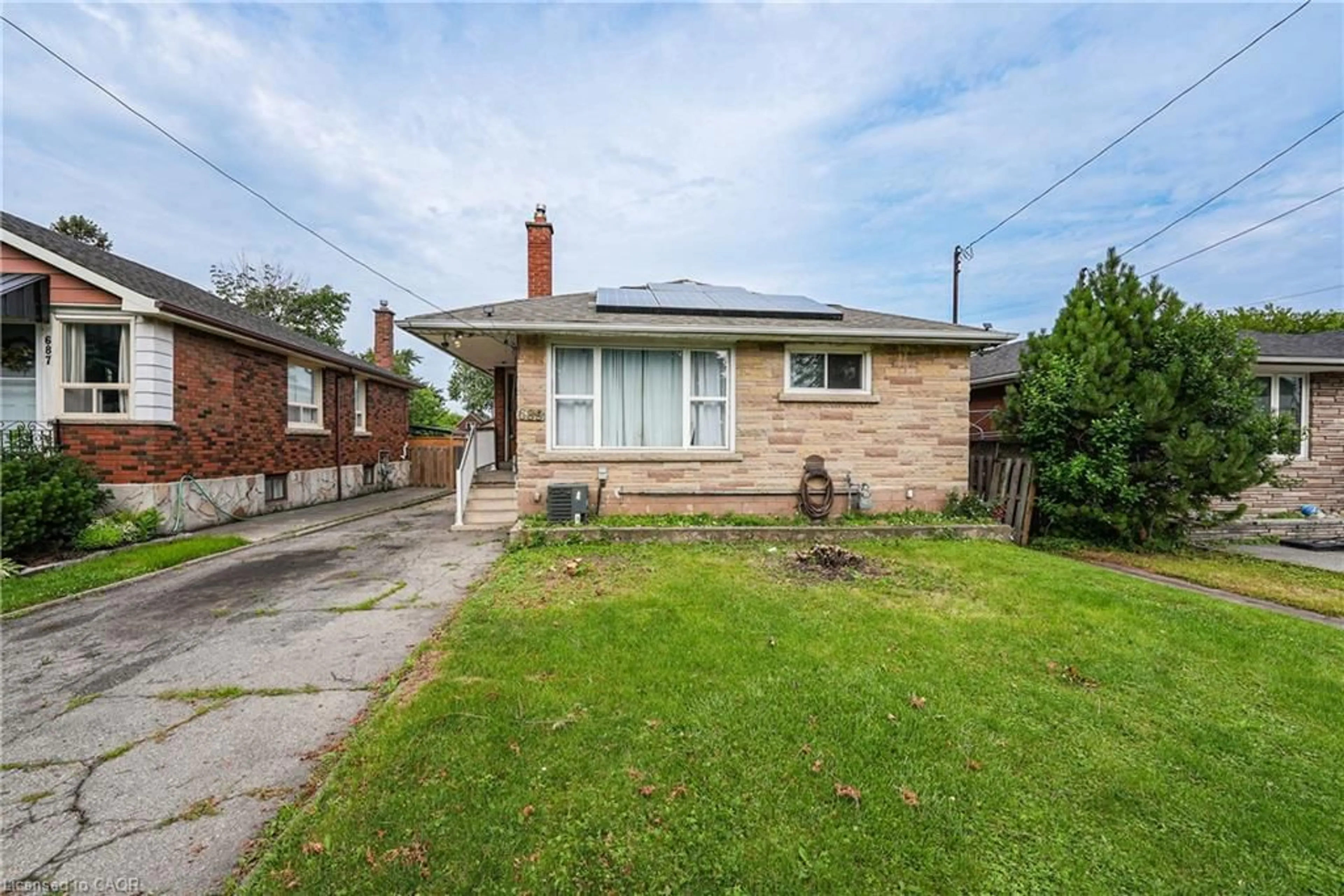 Home with brick exterior material, street for 689 Burgess Ave, Hamilton Ontario L8H 6J2