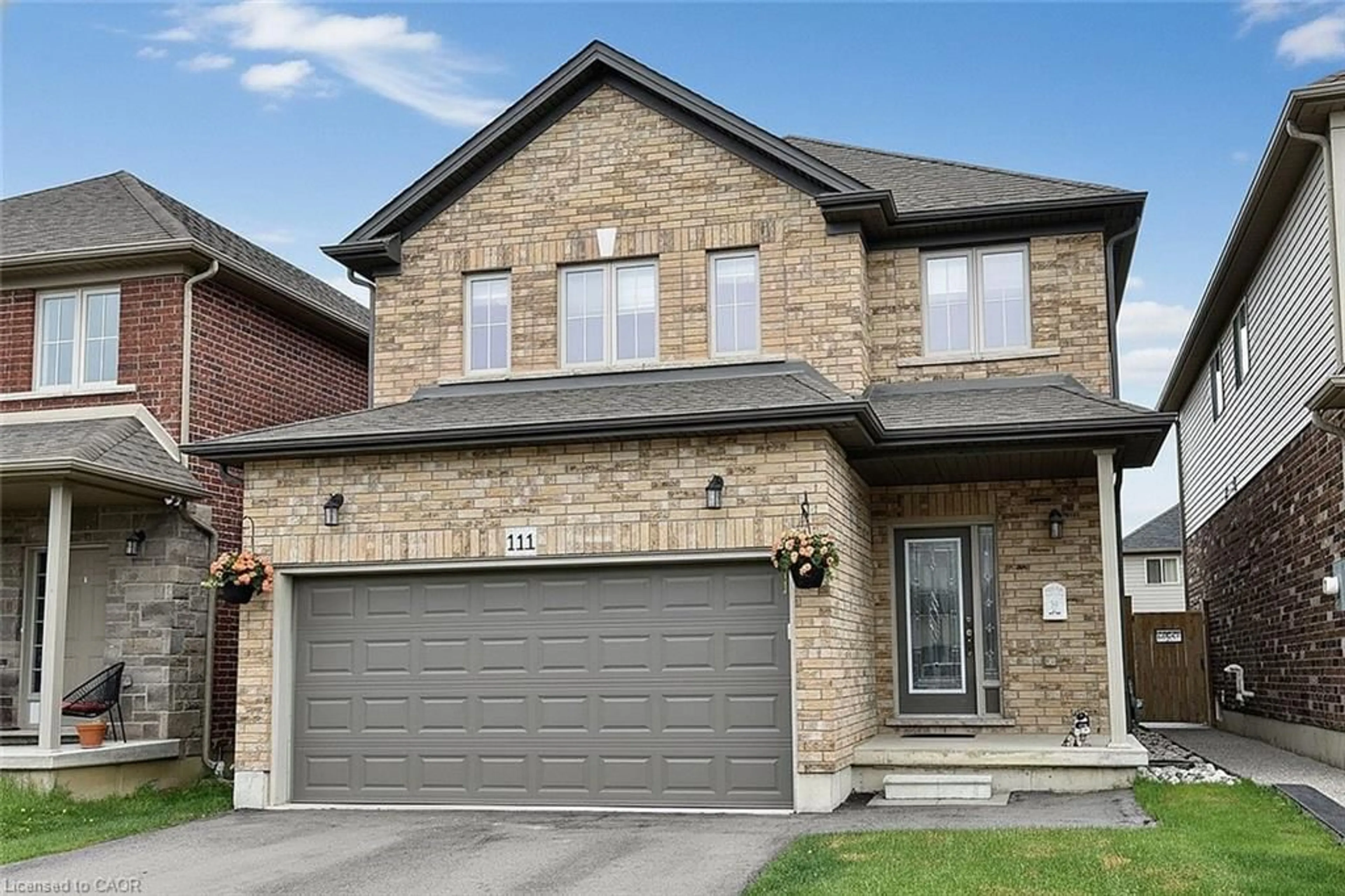 Home with brick exterior material, street for 111 Festival Way, Binbrook Ontario L0R 1C0