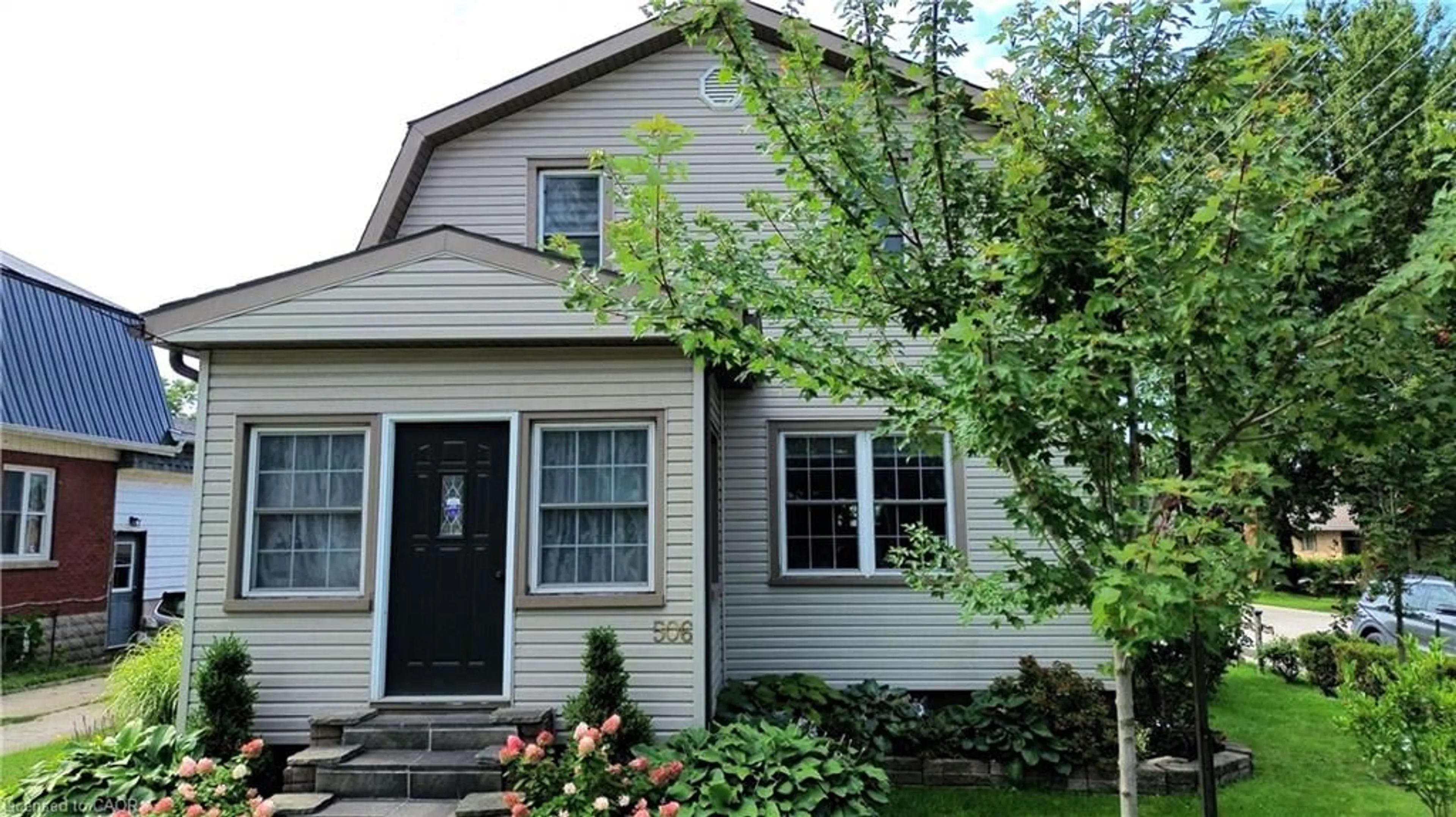 Home with vinyl exterior material, street for 506 Main St, Listowel Ontario N4W 2C6