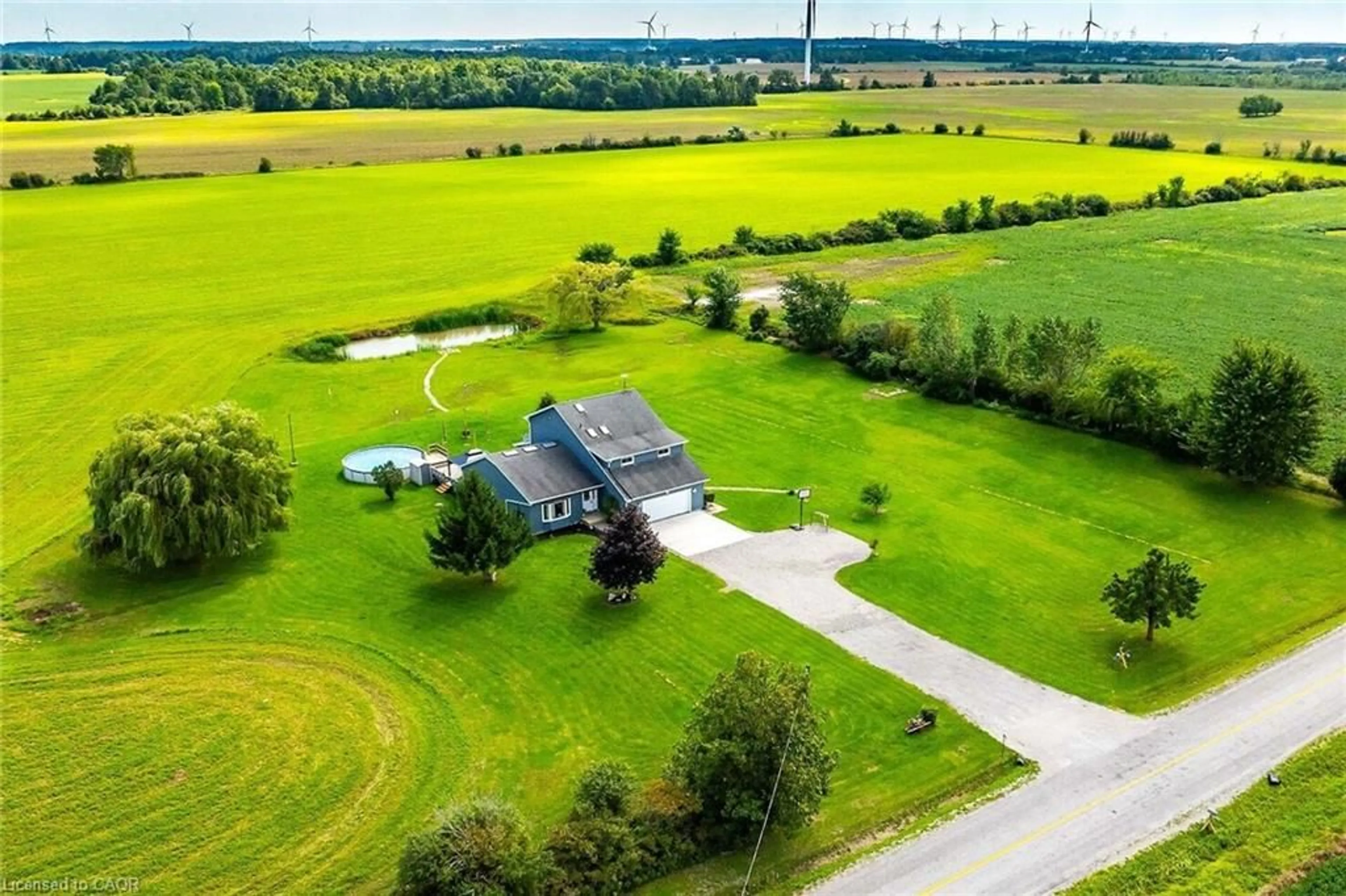 A pic from outside/outdoor area/front of a property/back of a property/a pic from drone, water/lake/river/ocean view for 450 Concession 6 Rd, Fisherville Ontario N0A 1G0