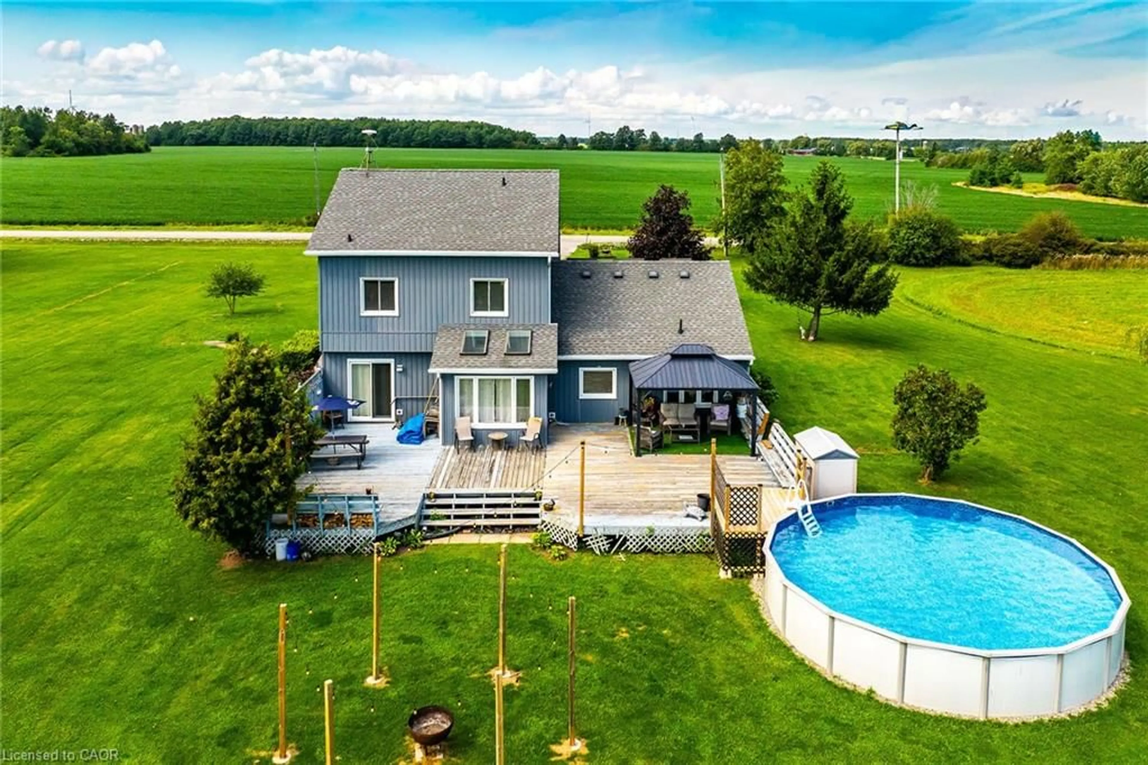A pic from outside/outdoor area/front of a property/back of a property/a pic from drone, water/lake/river/ocean view for 450 Concession 6 Rd, Fisherville Ontario N0A 1G0