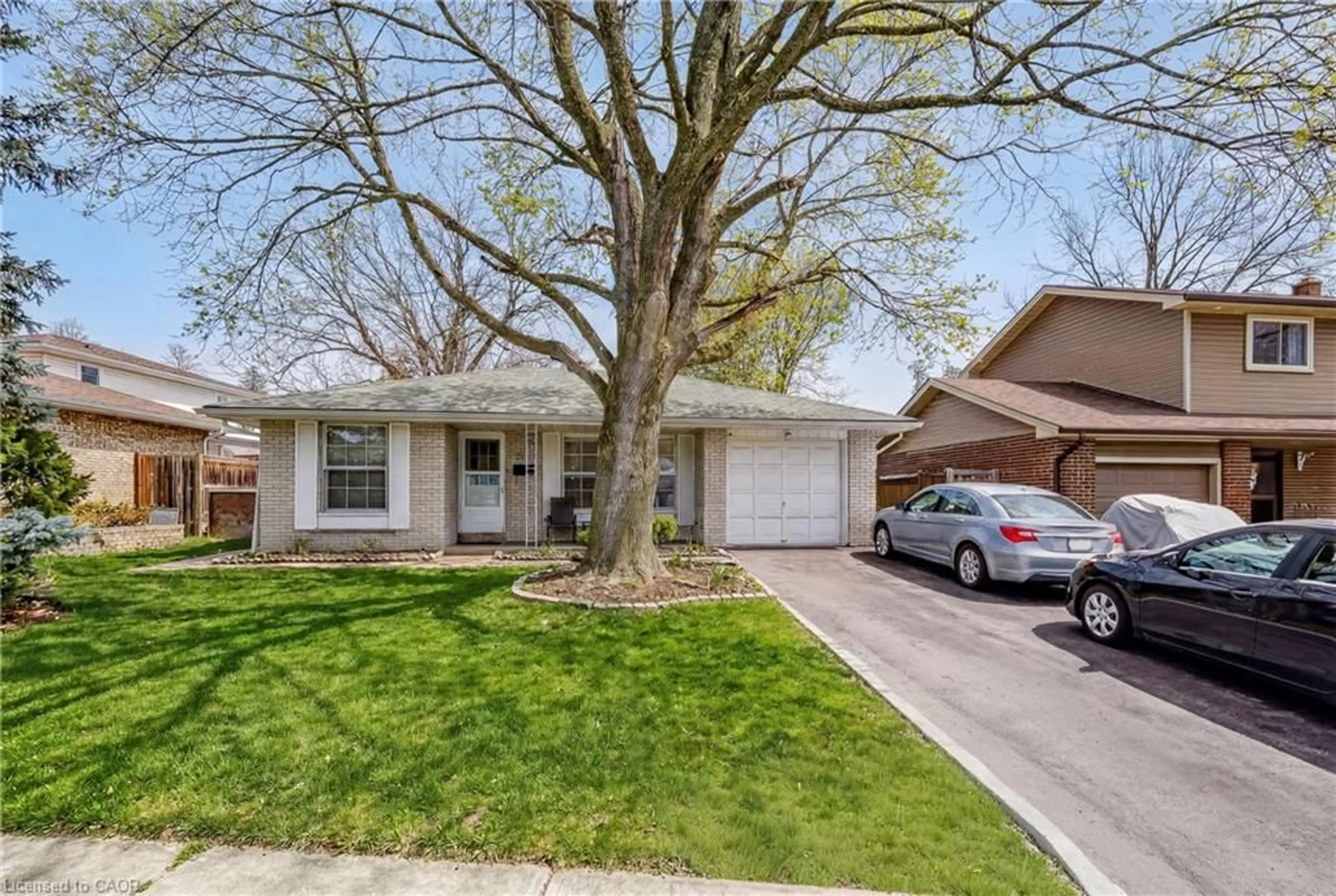 Home with brick exterior material, street for 2145 Sandringham Dr, Burlington Ontario L7P 1T8
