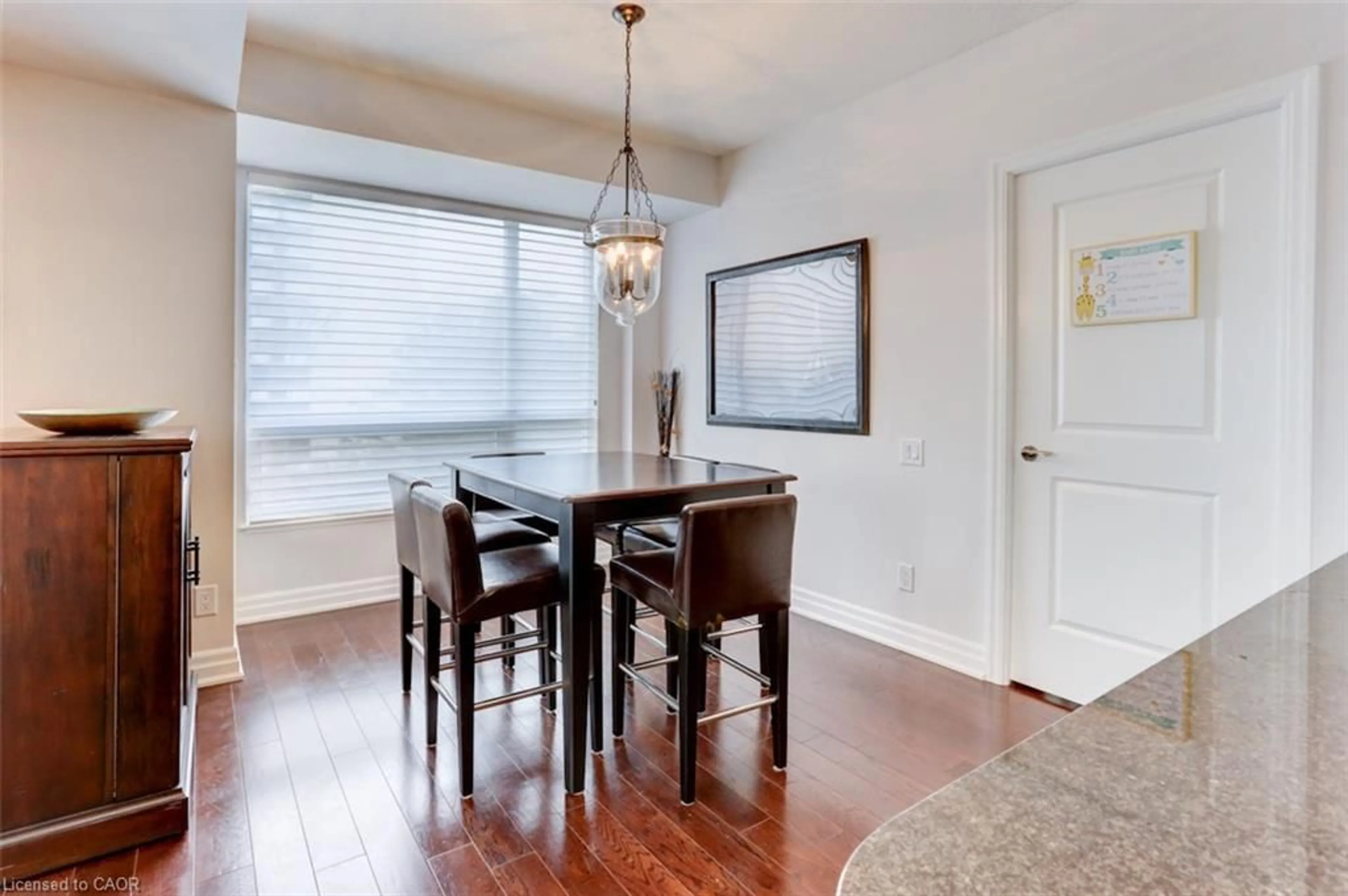 Dining room, wood/laminate floor for 17 Ruddington Dr #402, North York Ontario M2K 0A8