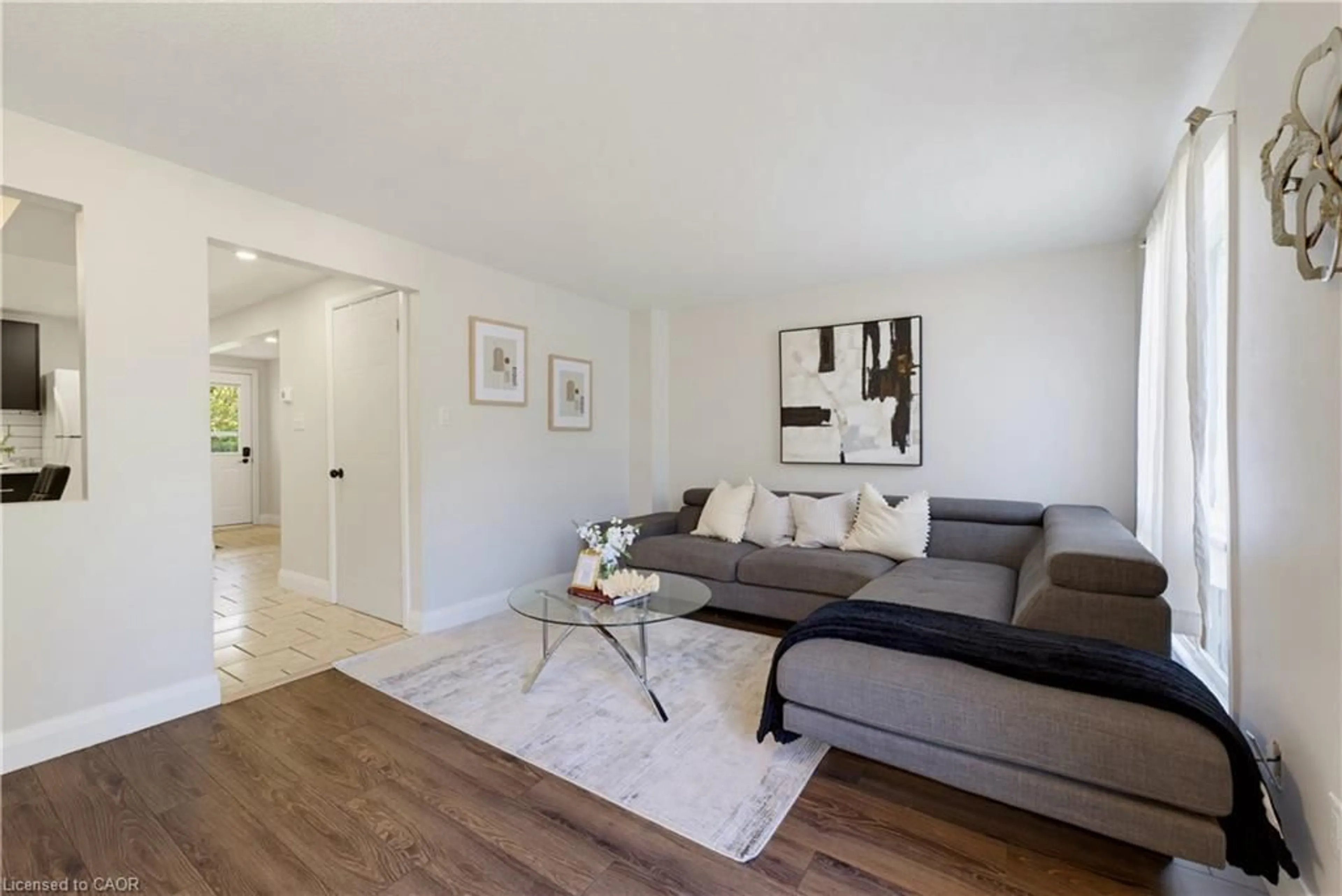 Living room with furniture, wood/laminate floor for 80 Highland Cres, Kitchener Ontario N2M 5C1