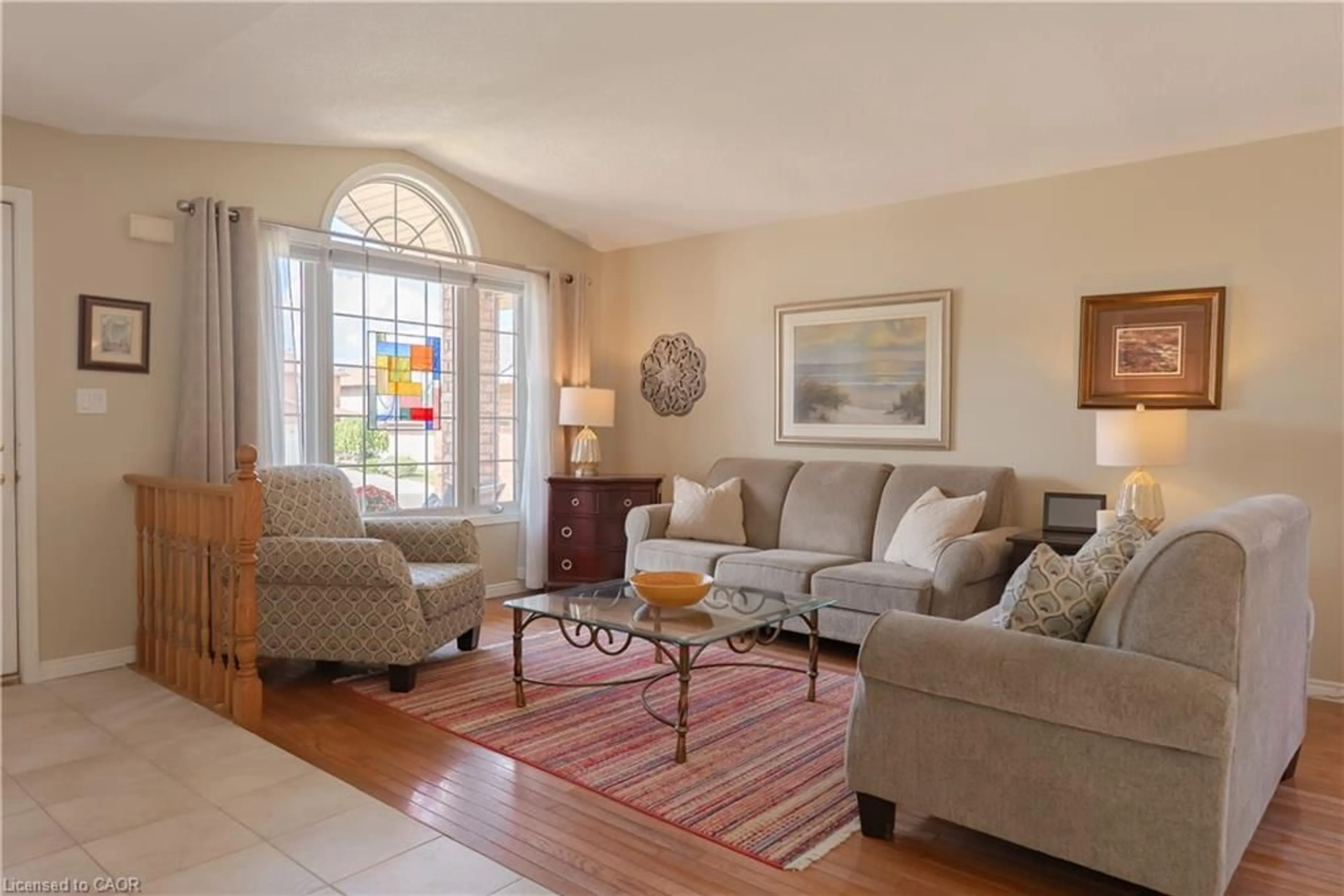 Living room with furniture, ceramic/tile floor for 54 Republic Ave, Hamilton Ontario L9B 2G7