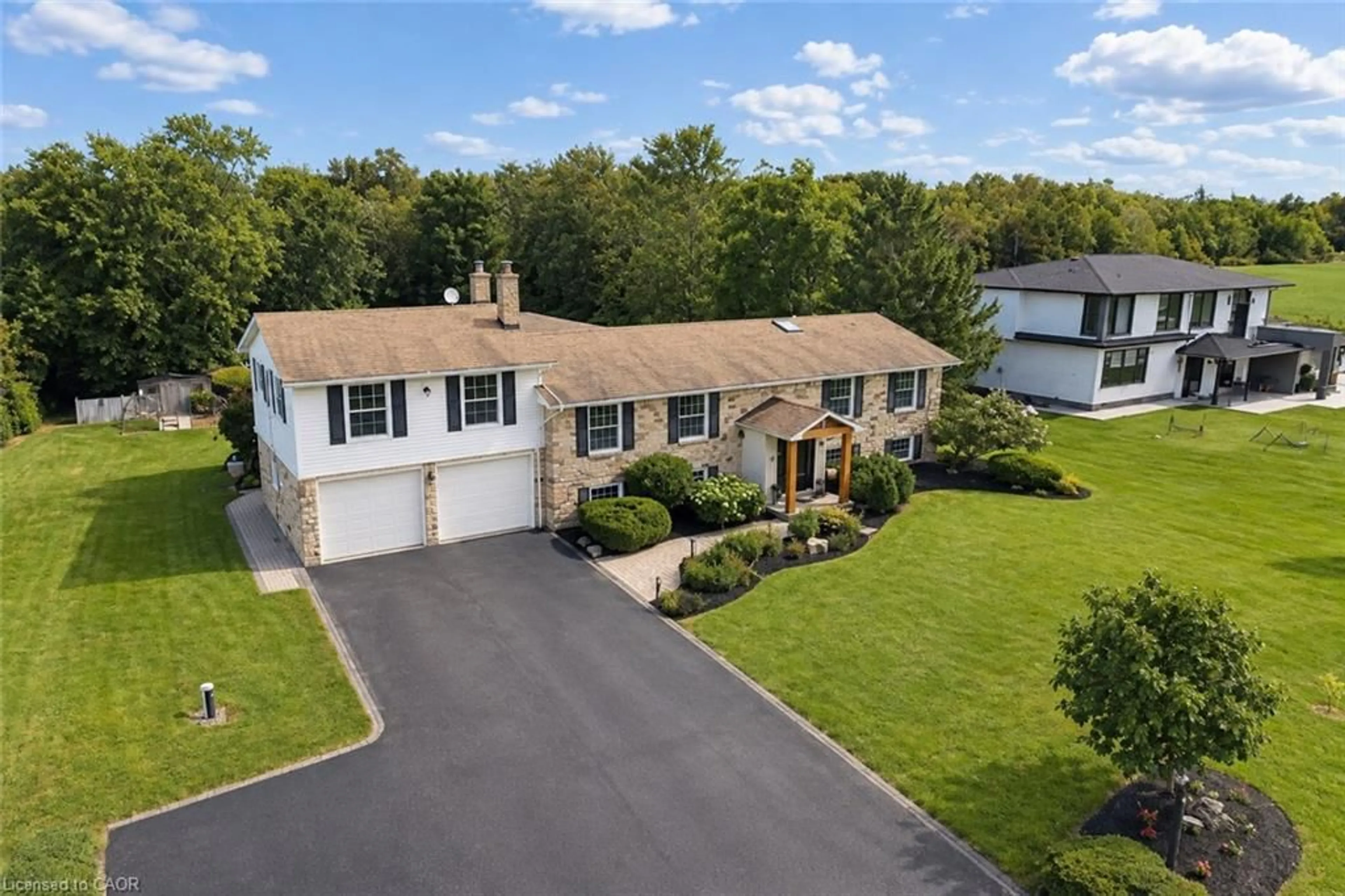 A pic from outside/outdoor area/front of a property/back of a property/a pic from drone, street for 4202 1 Side Road, Burlington Ontario L7M 0X3