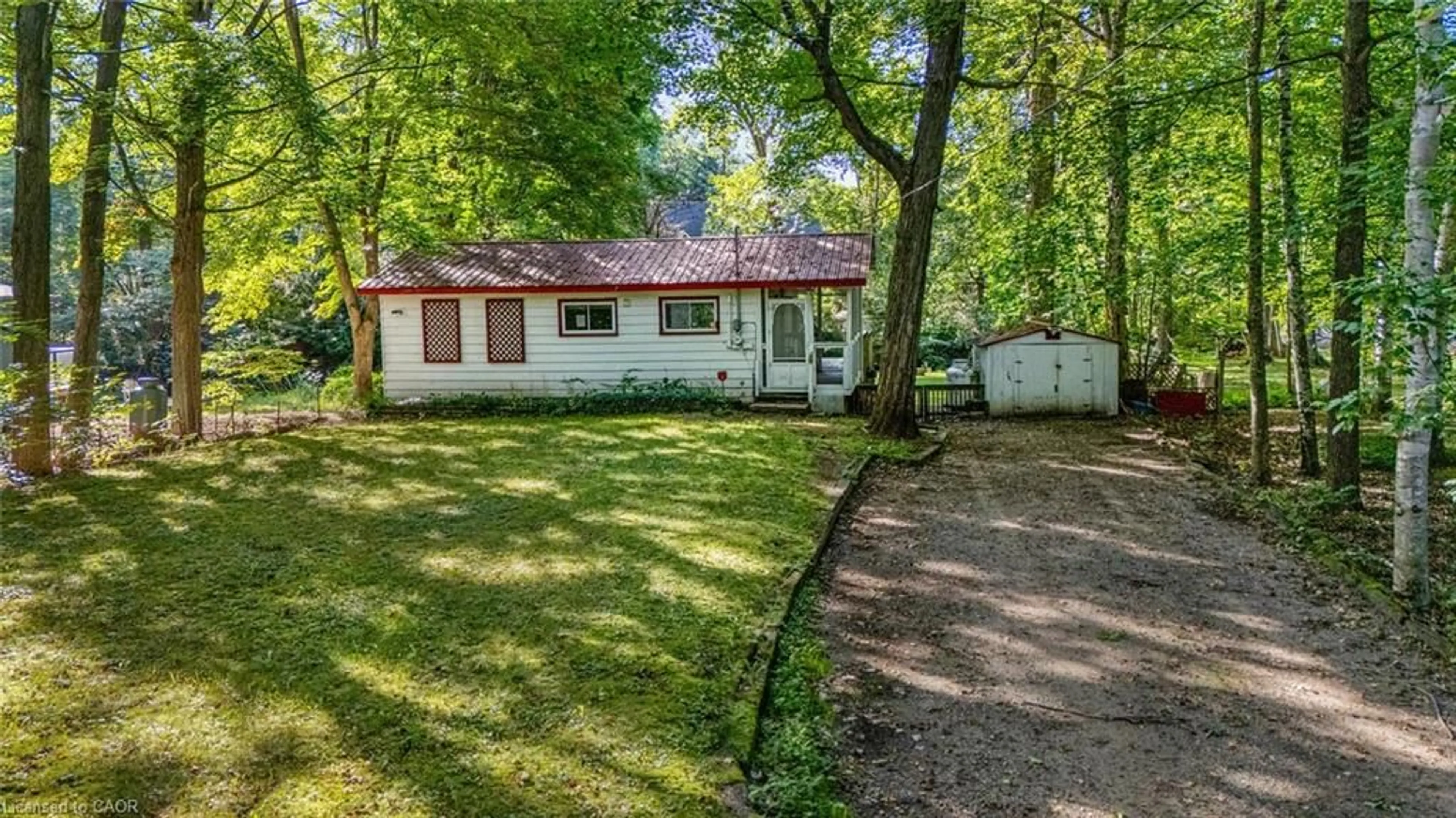 A pic from outside/outdoor area/front of a property/back of a property/a pic from drone, unknown for 7465 East River Rd, Washago Ontario L0K 2B0
