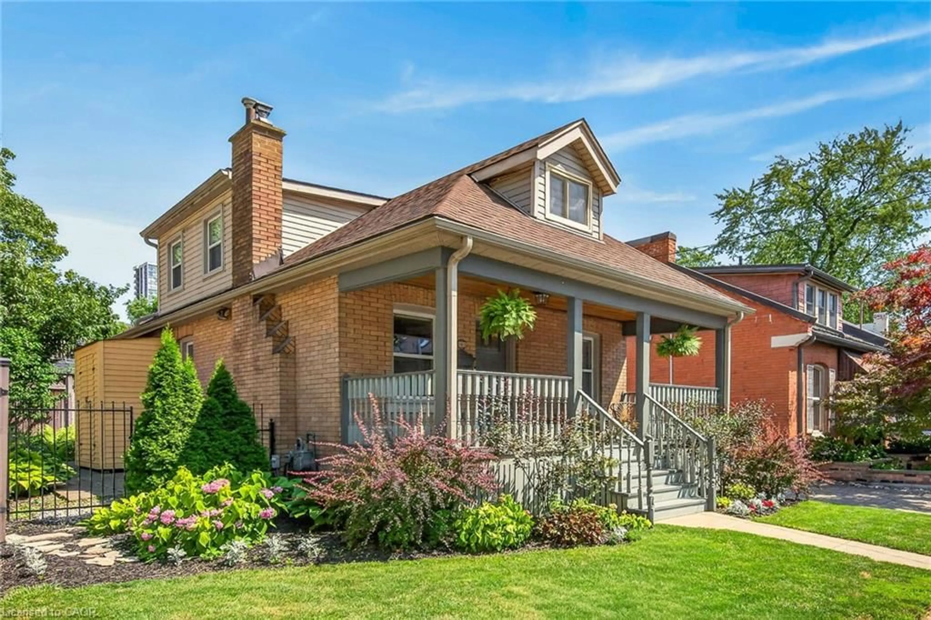Home with brick exterior material, street for 163 Hess St, Hamilton Ontario L8P 3N8