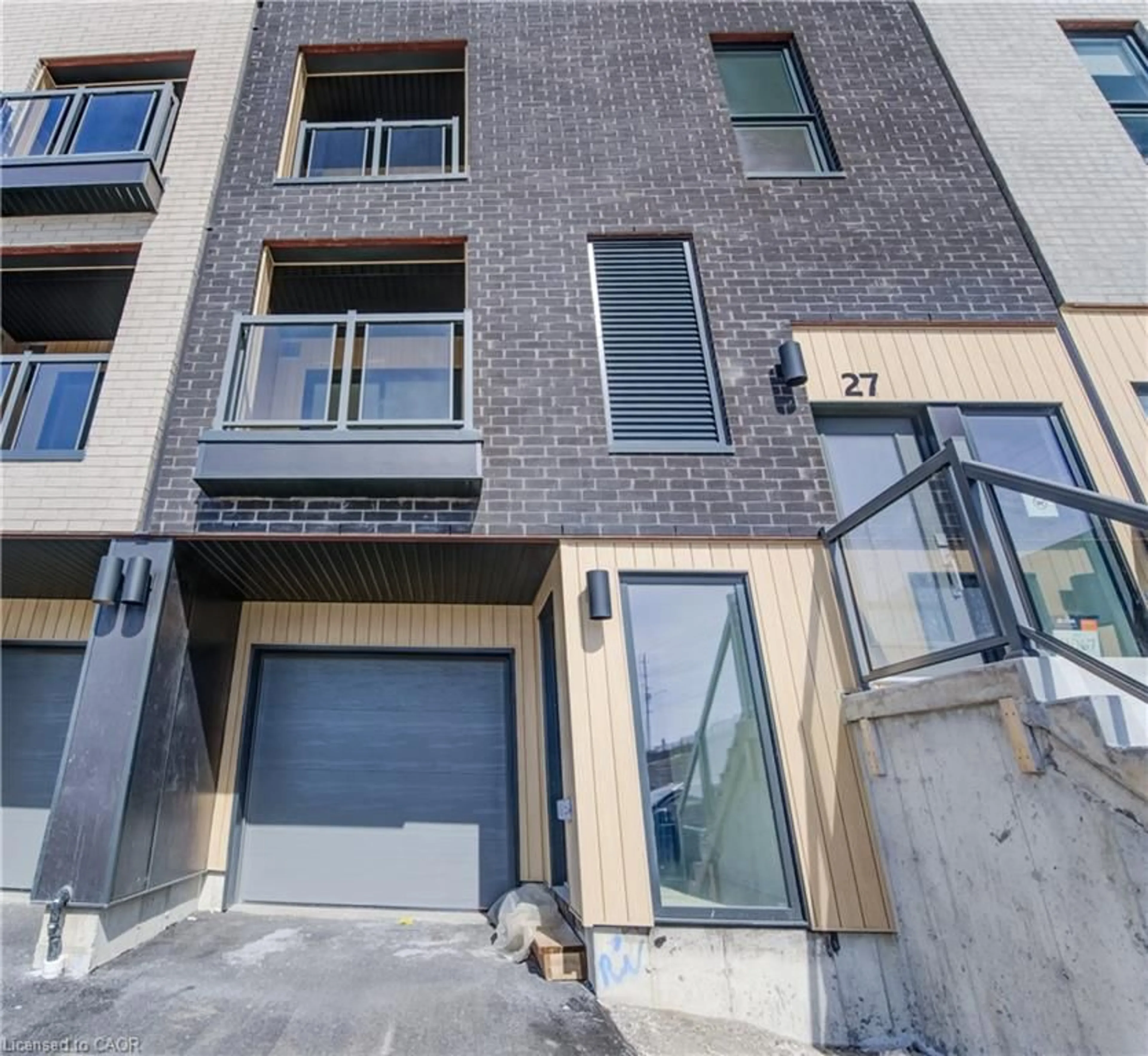 Home with brick exterior material, street for 27 Urbane Blvd, Kitchener Ontario N2E 0H8