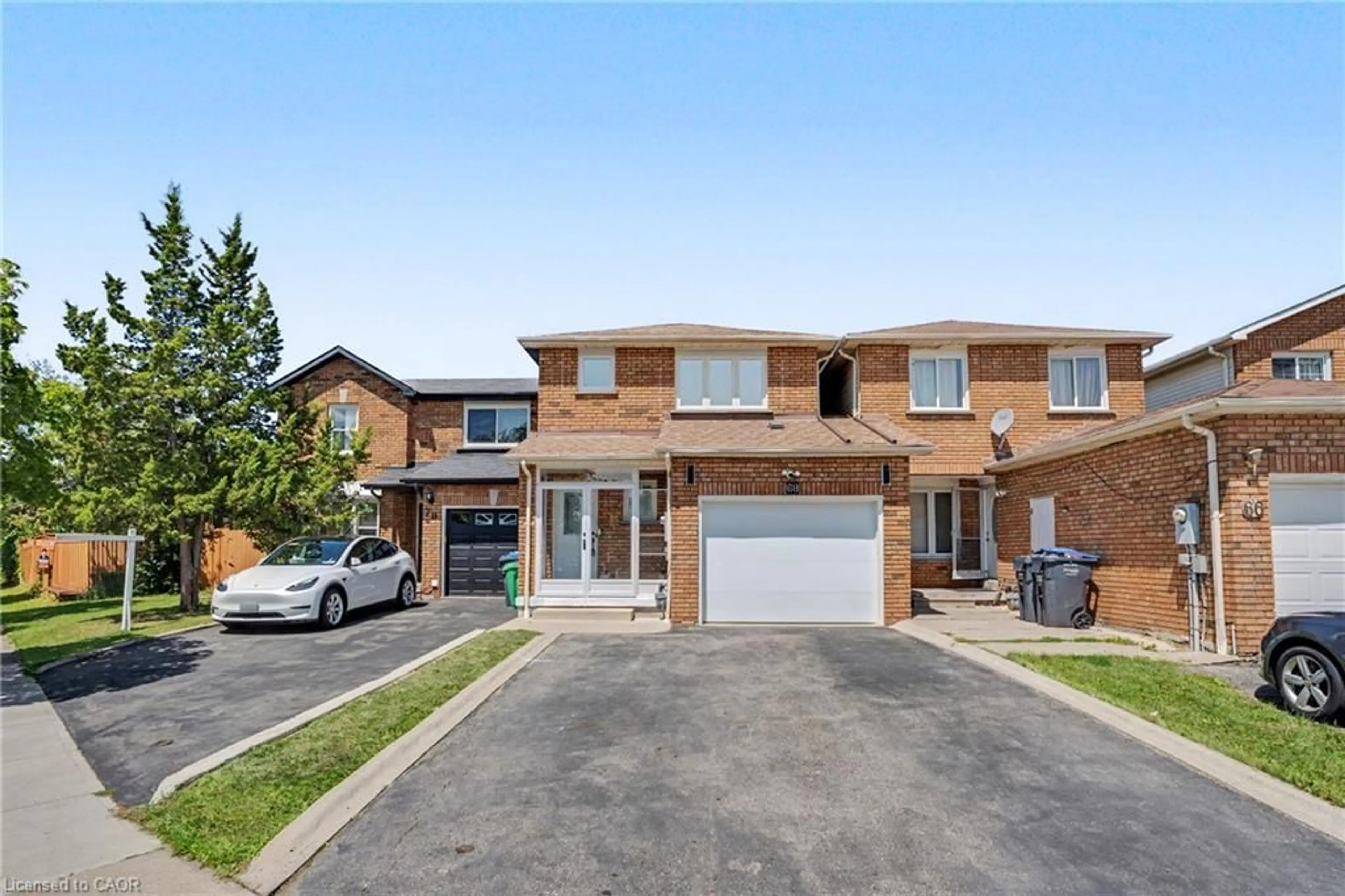 Home with brick exterior material, street for 68 Tulip Dr, Brampton Ontario L6Y 3W7