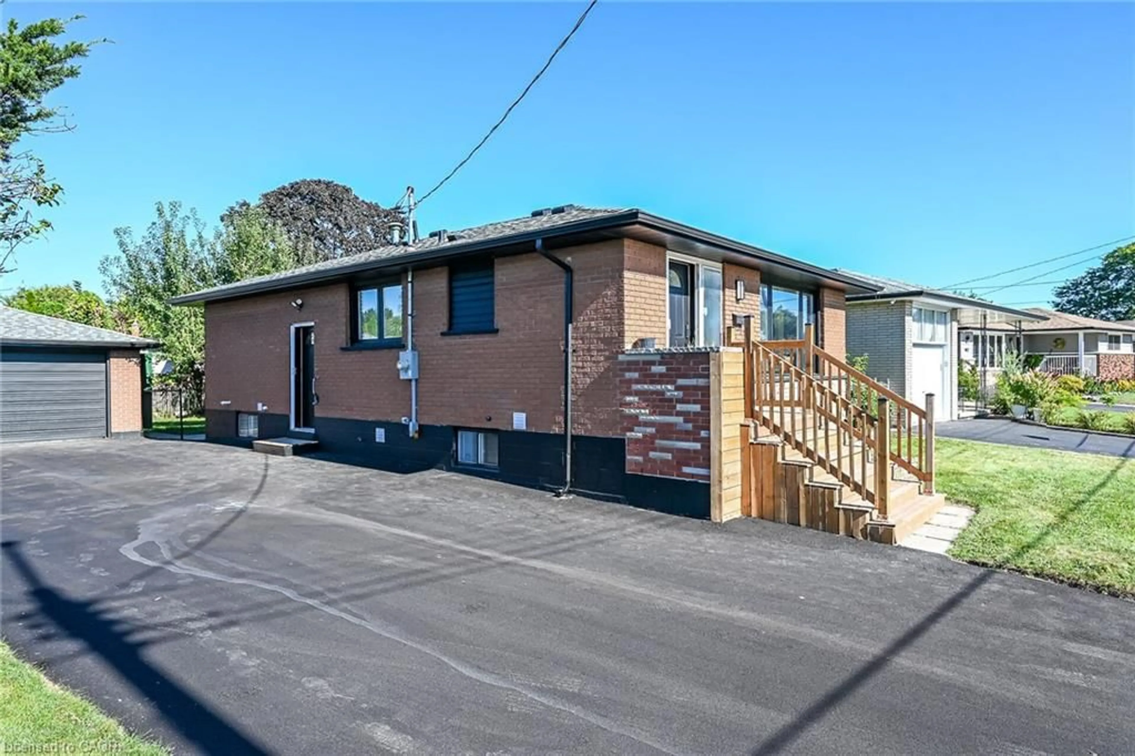 Home with vinyl exterior material, street for 135 Nugent Dr, Hamilton Ontario L8H 2N3
