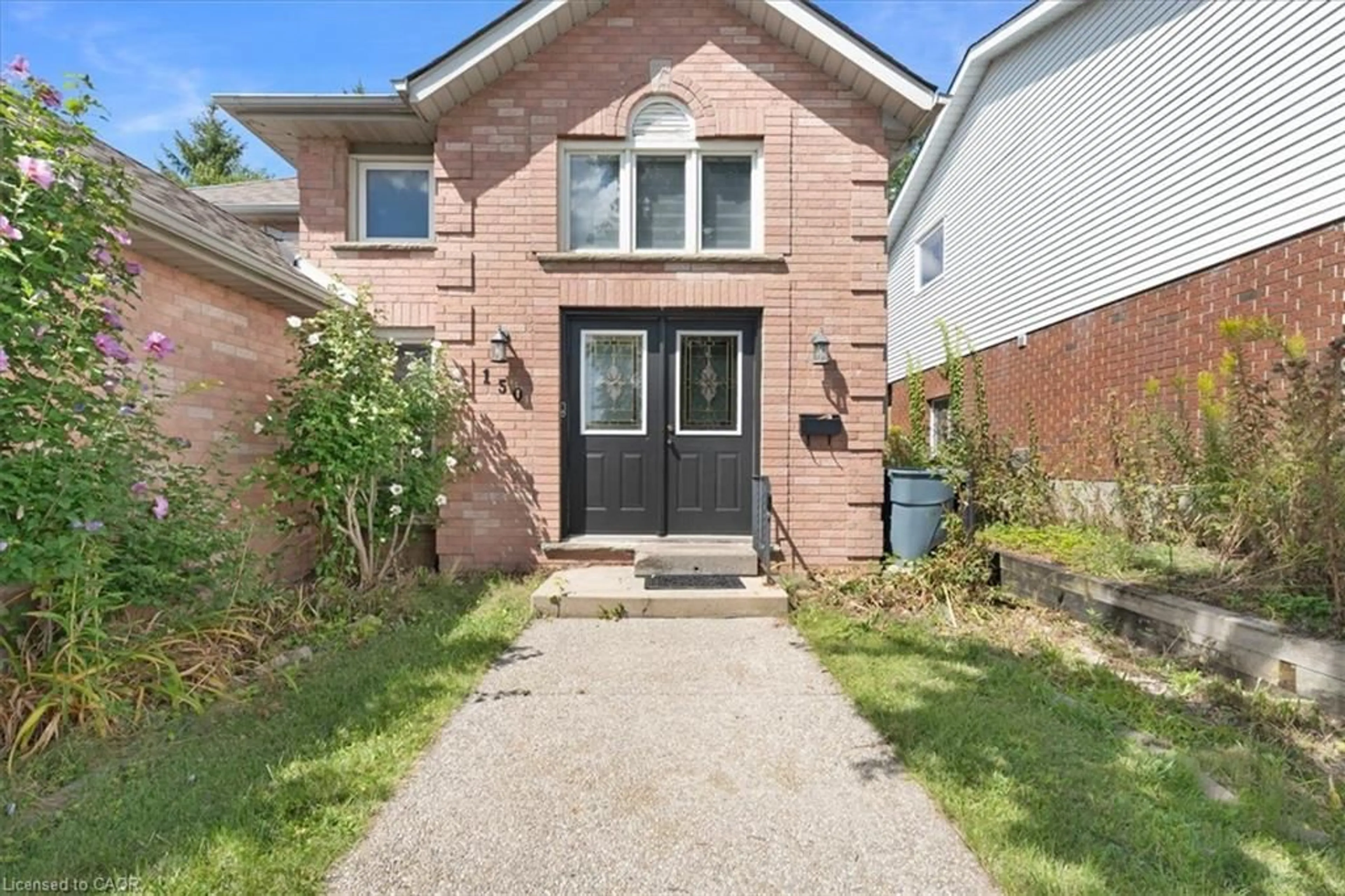 Home with brick exterior material, street for 150 Bankside Dr, Kitchener Ontario N2N 3E4