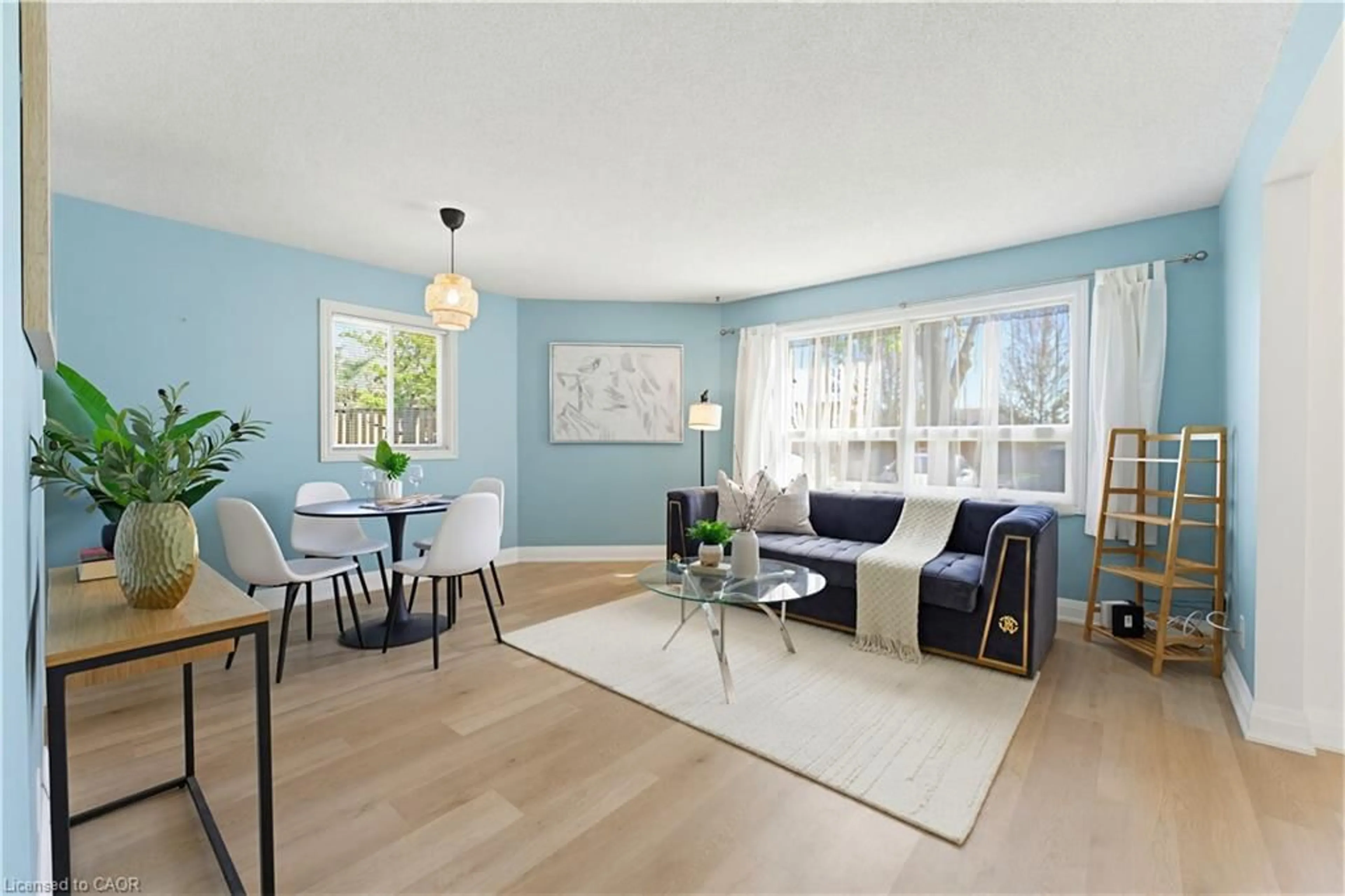 Living room with furniture, wood/laminate floor for 30 Hugo Cres #110, Kitchener Ontario N2M 3Z2