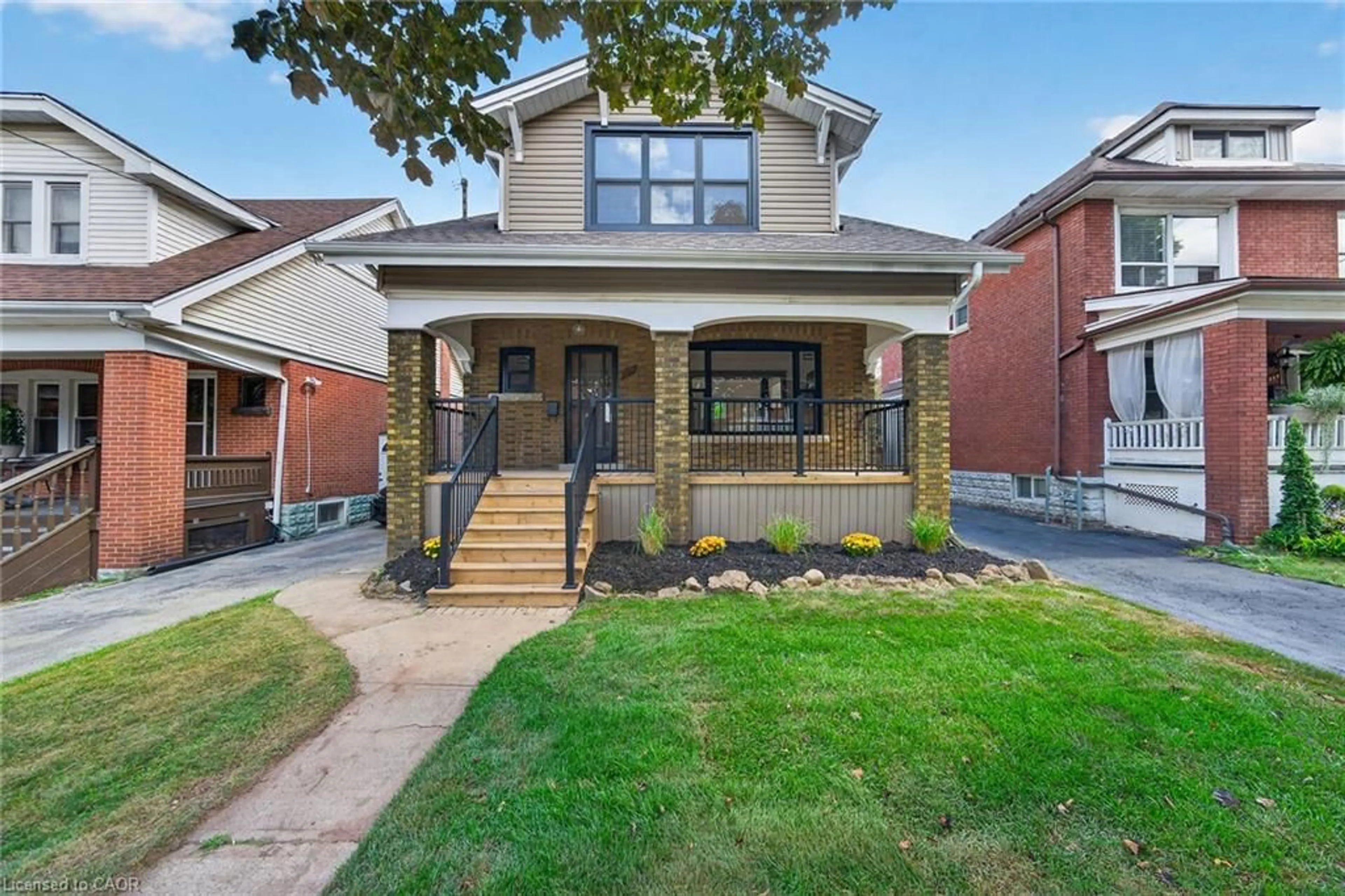 Home with brick exterior material, street for 229 Park Row, Hamilton Ontario L8K 2K4