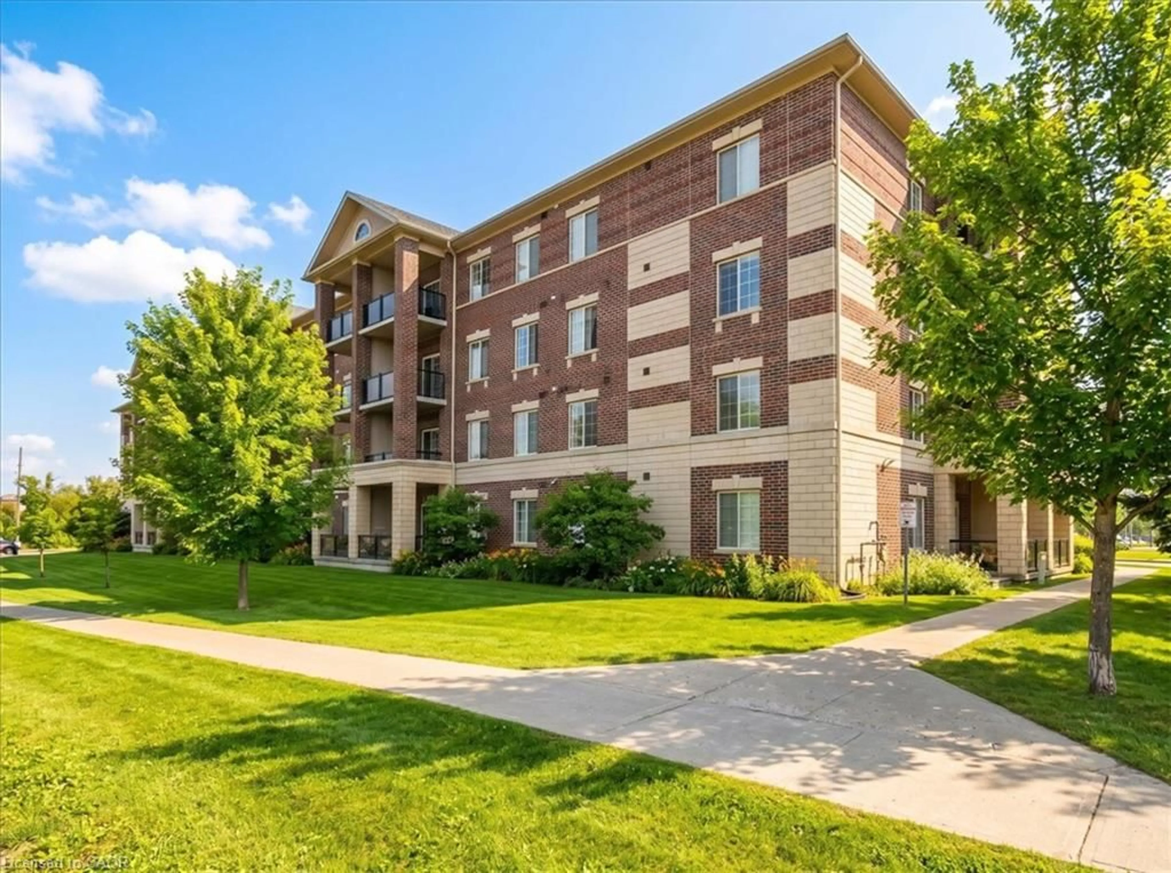 Home with brick exterior material, building for 308 Watson Pky #205, Guelph Ontario N1E 0G7