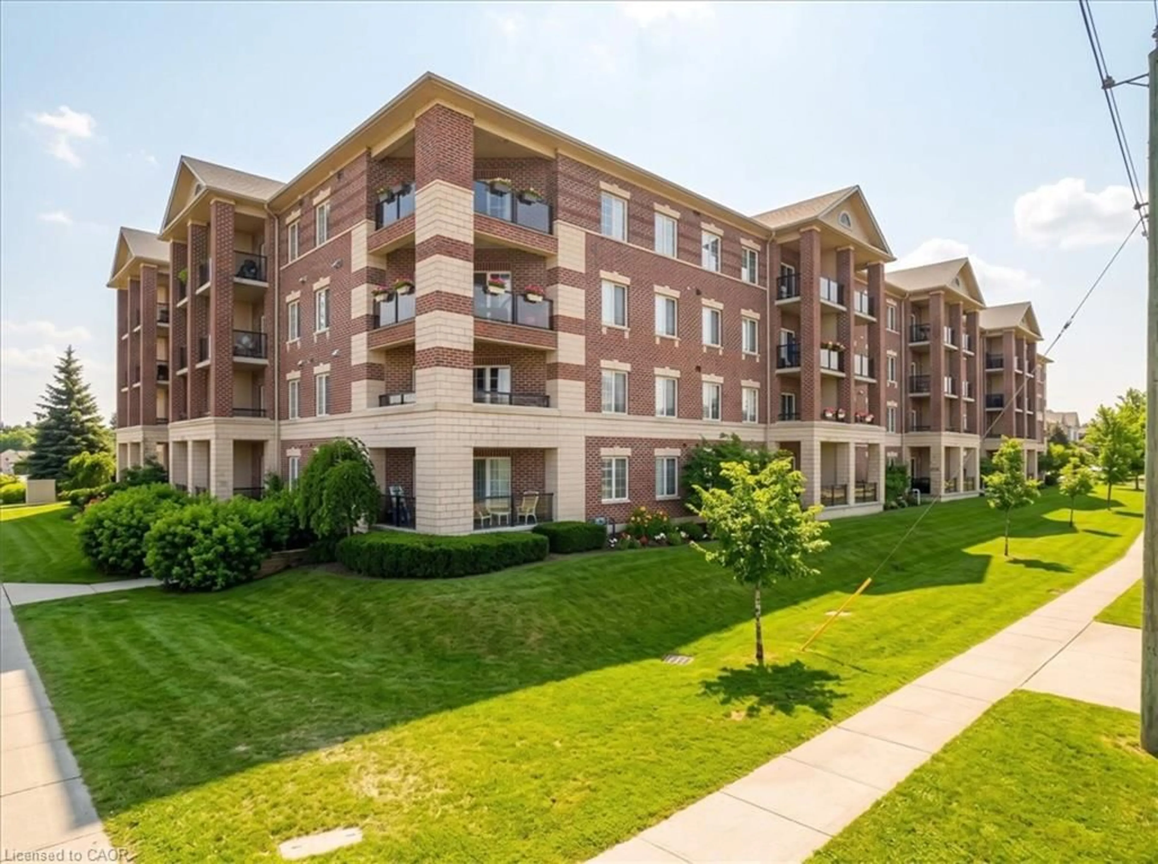 A pic from outside/outdoor area/front of a property/back of a property/a pic from drone, building for 308 Watson Pky #205, Guelph Ontario N1E 0G7