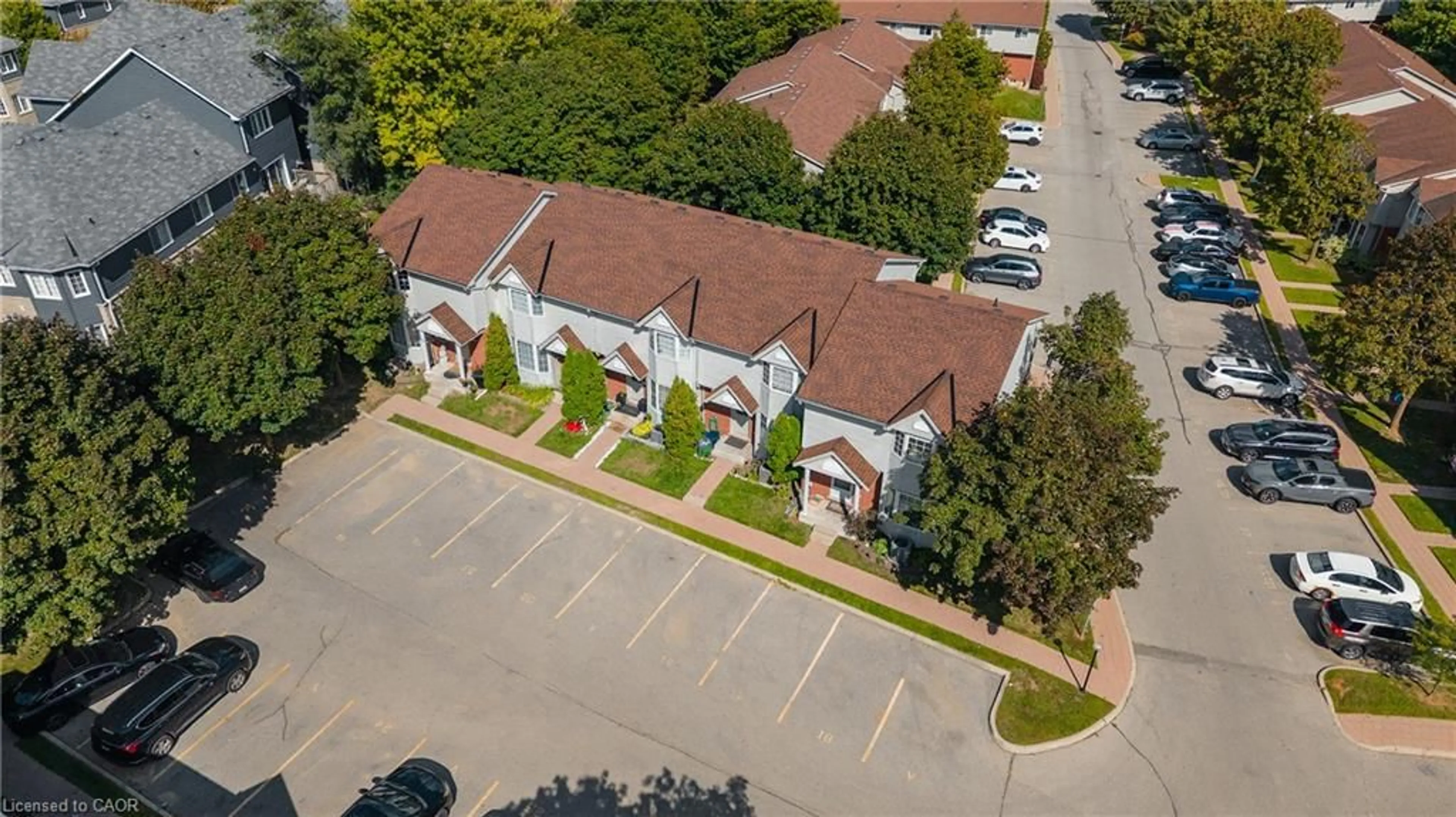 A pic from outside/outdoor area/front of a property/back of a property/a pic from drone, street for 235 Saginaw Pky #18, Cambridge Ontario N1T 1X4