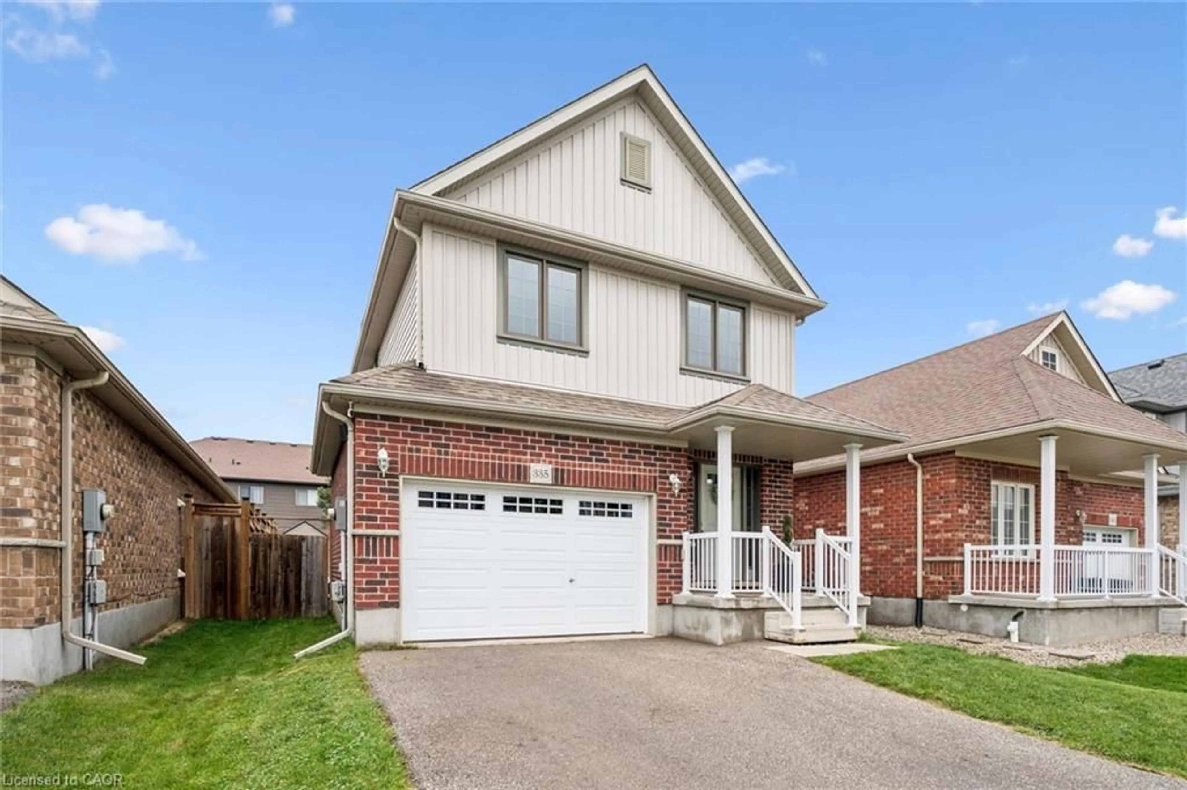Home with brick exterior material, street for 335 Finoro Cres, Elmira Ontario N3B 0C3