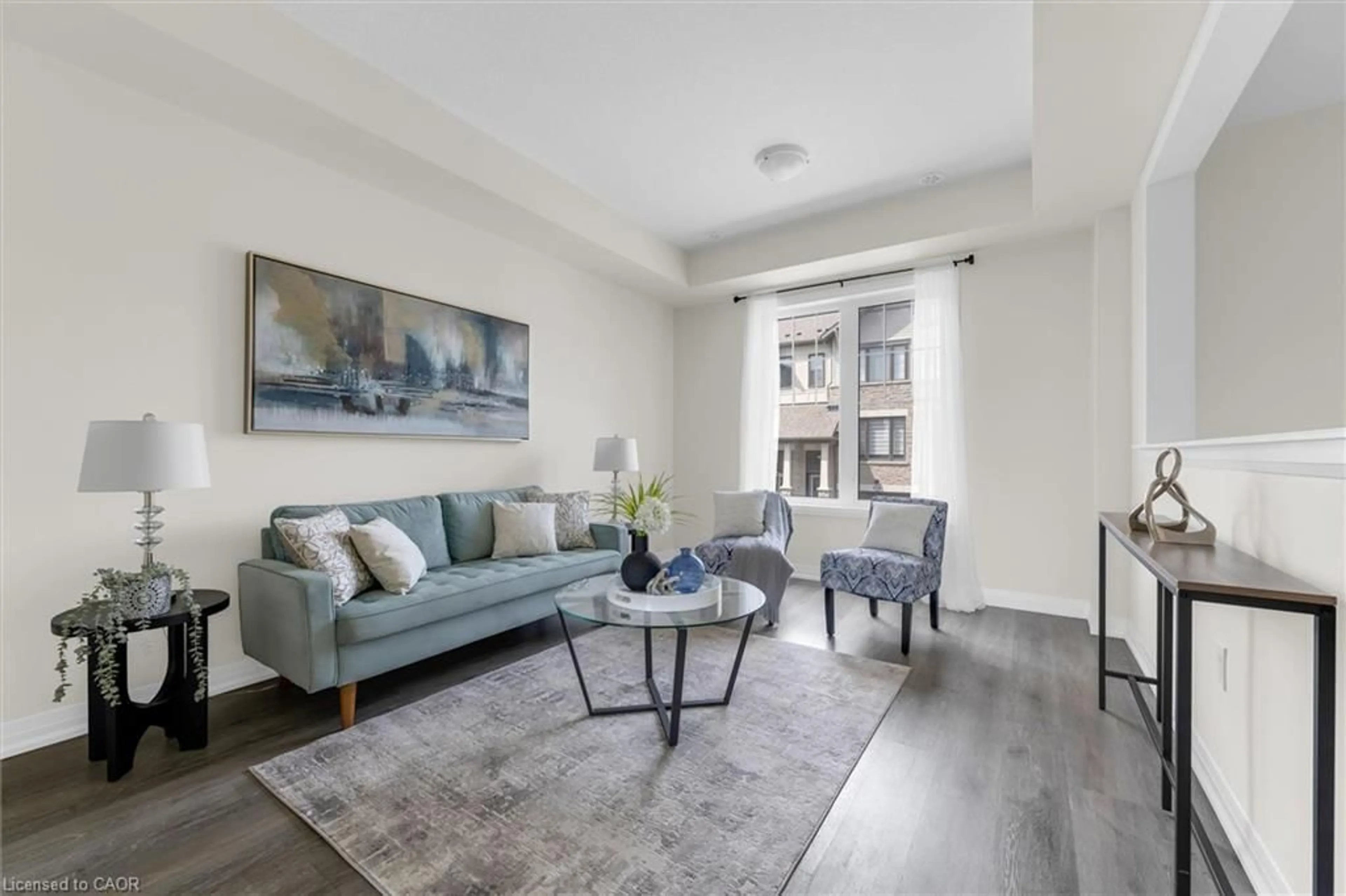 Living room with furniture, unknown for 185 Bedrock Dr #24, Stoney Creek Ontario L8J 0M5