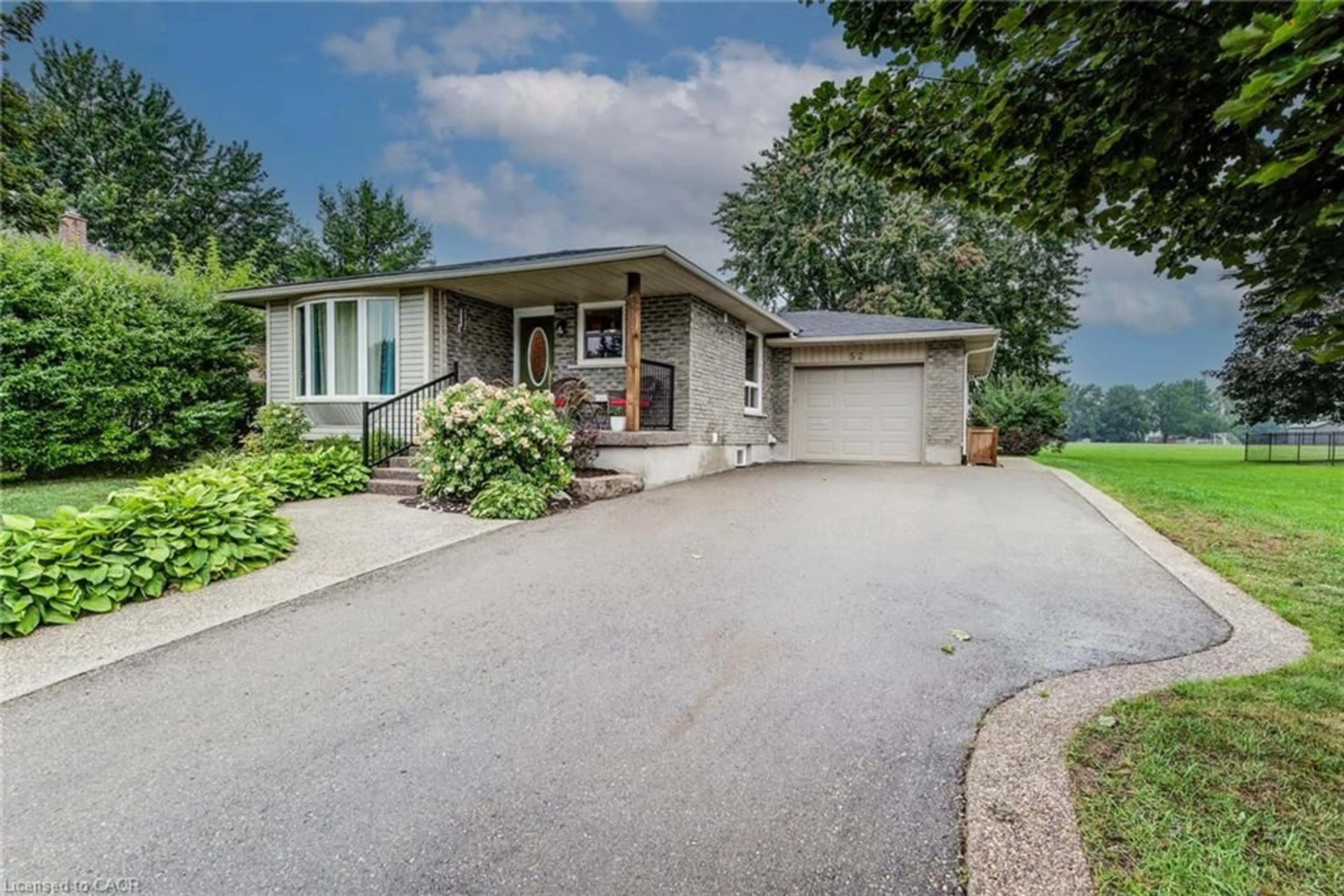 A pic from outside/outdoor area/front of a property/back of a property/a pic from drone, unknown for 52 Mockingbird Dr, Elmira Ontario N3B 3A6
