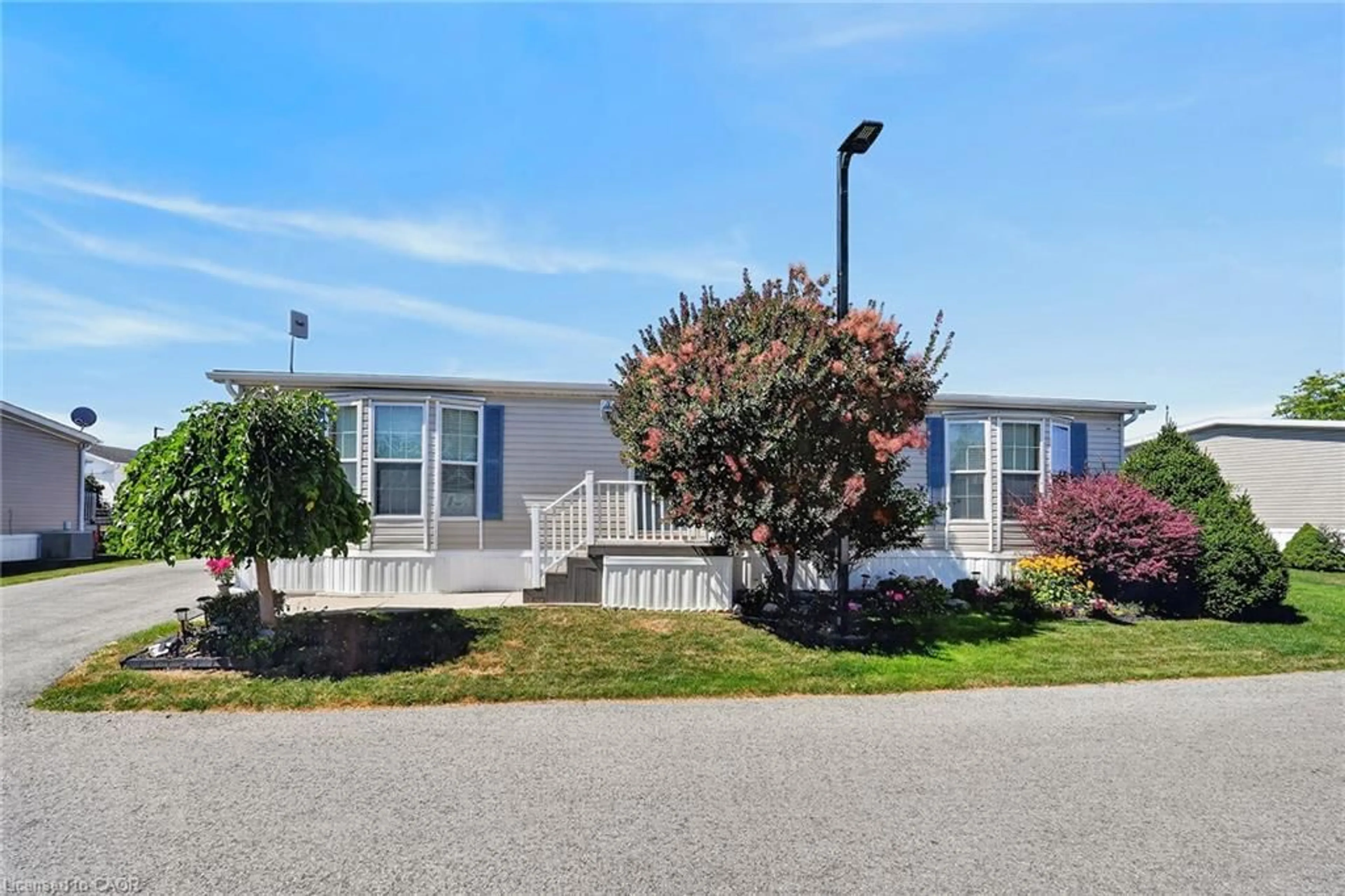 Home with vinyl exterior material, street for 3033 Townline Rd #393, Stevensville Ontario L0S 1S1