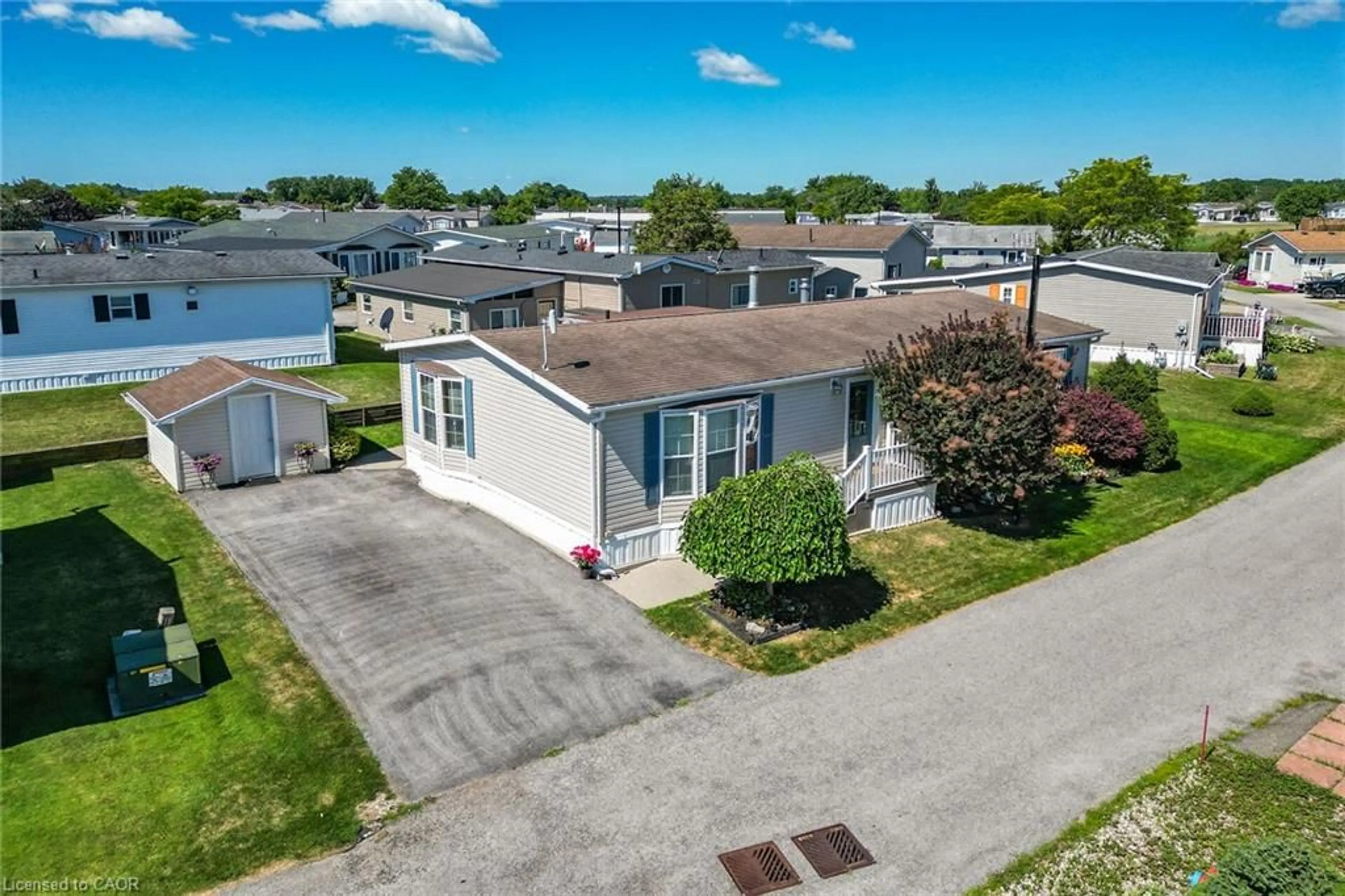 A pic from outside/outdoor area/front of a property/back of a property/a pic from drone, street for 3033 Townline Rd #393, Stevensville Ontario L0S 1S1