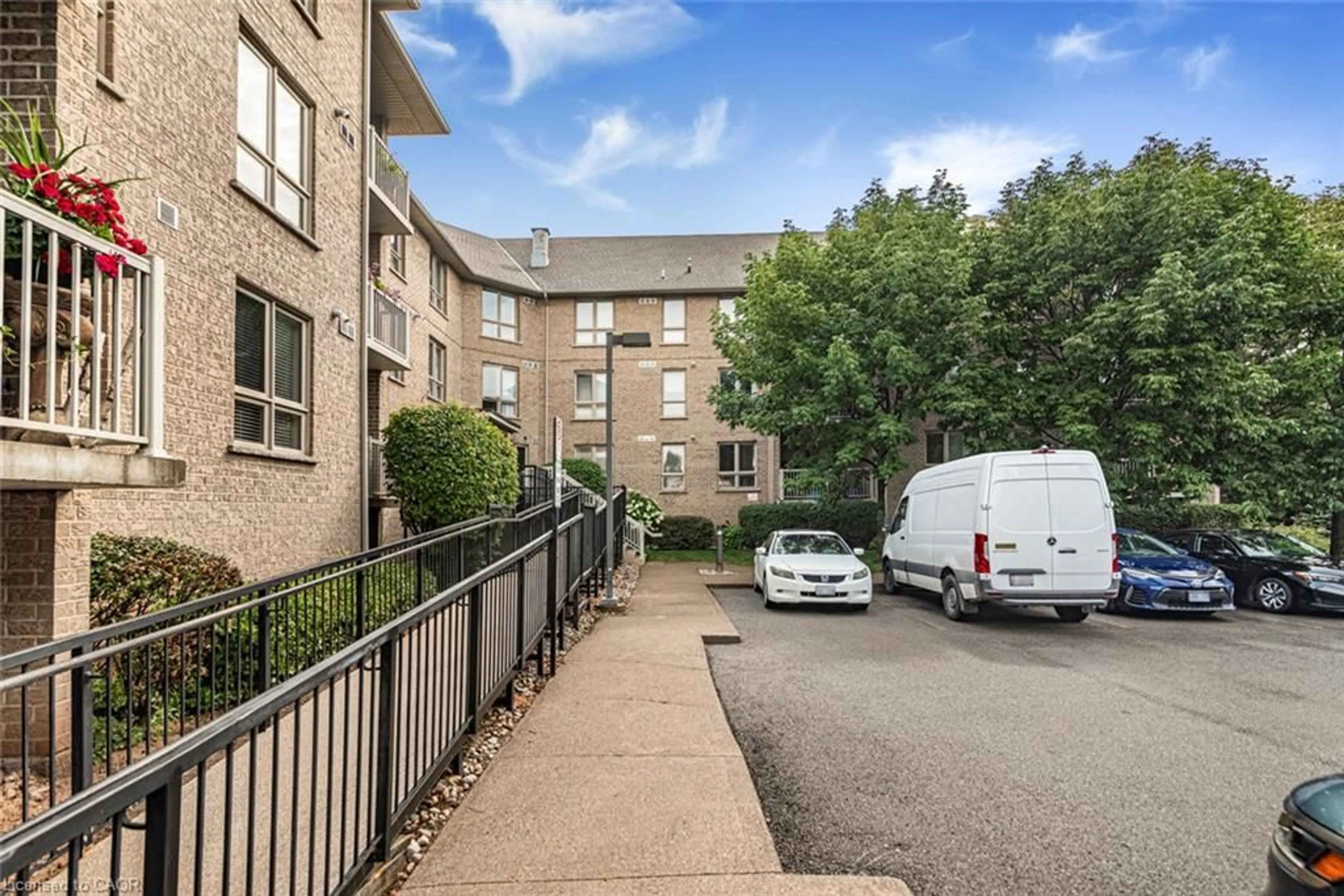 A pic from outside/outdoor area/front of a property/back of a property/a pic from drone, street for 56 Kerman Ave #105, Grimsby Ontario L3M 0A1