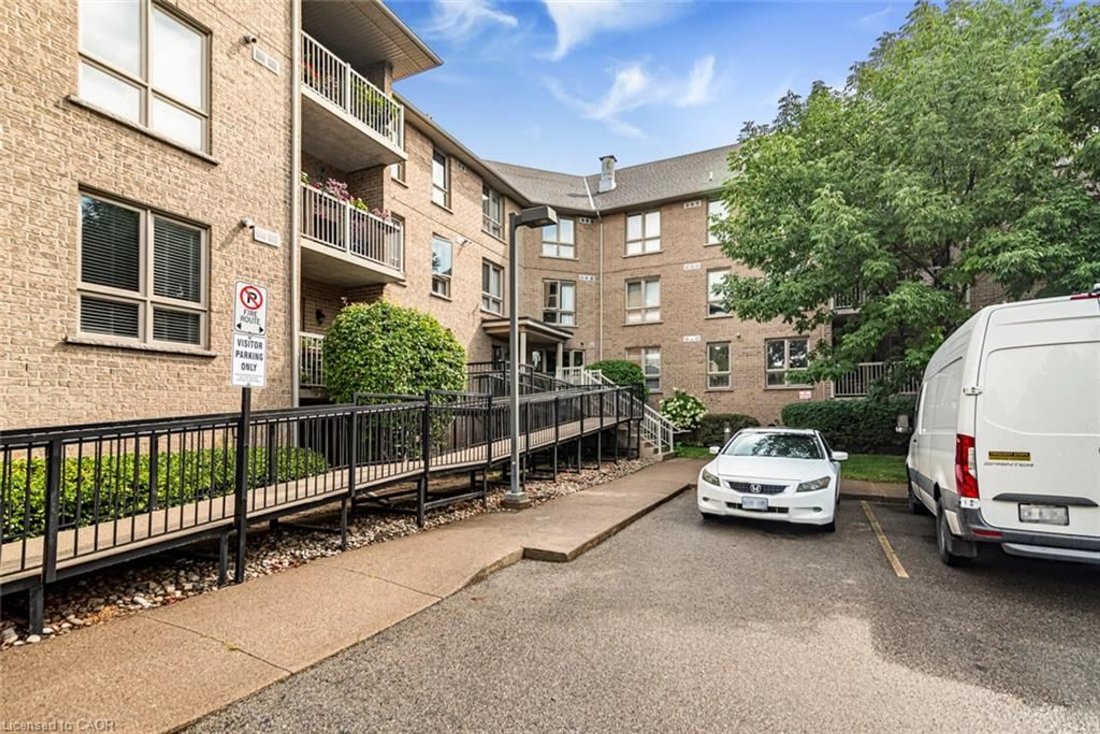 A pic from outside/outdoor area/front of a property/back of a property/a pic from drone, street for 56 Kerman Ave #105, Grimsby Ontario L3M 0A1