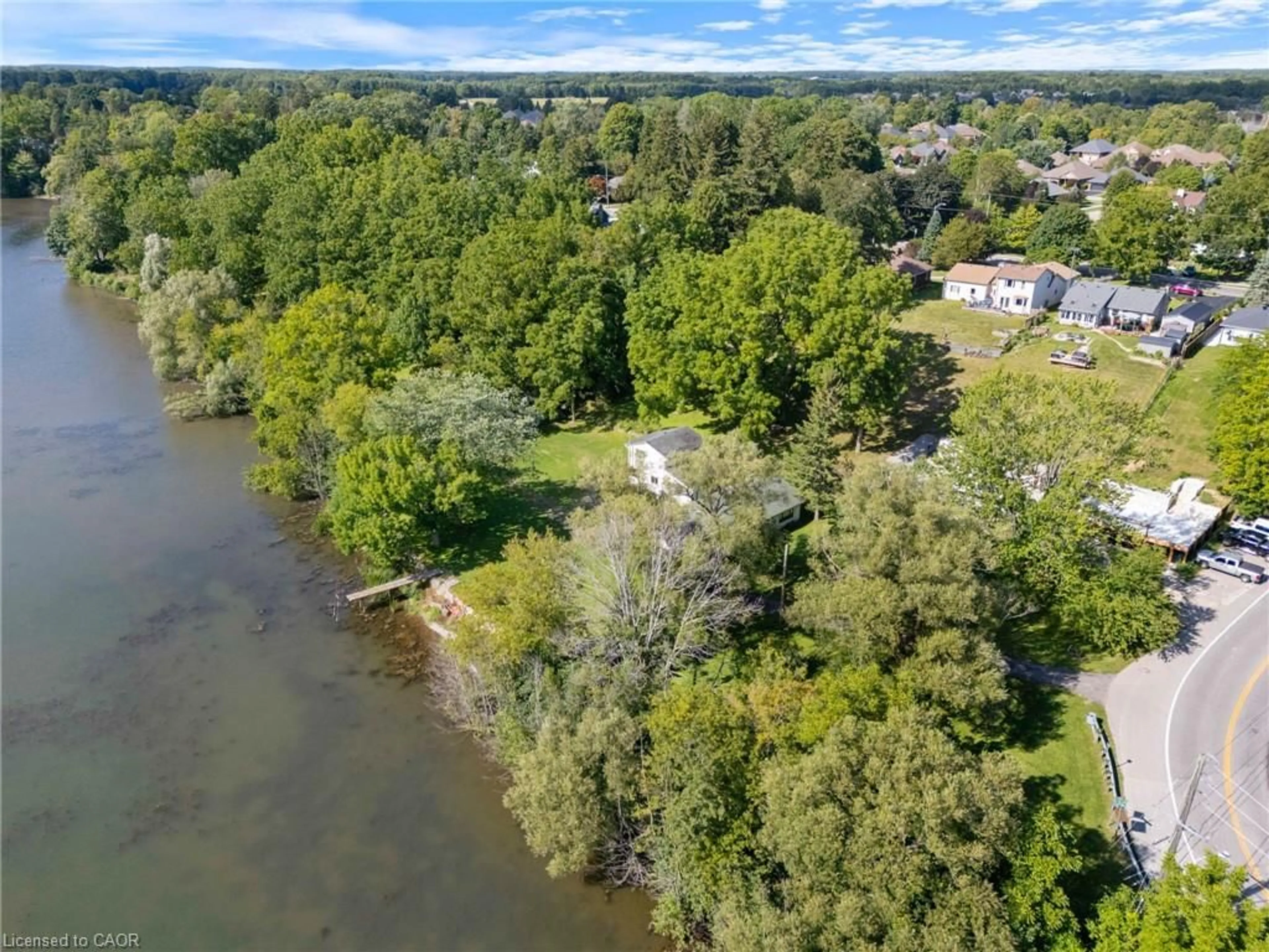 A pic from outside/outdoor area/front of a property/back of a property/a pic from drone, water/lake/river/ocean view for 1 Silver Lake Dr, Port Dover Ontario N0A 1N6