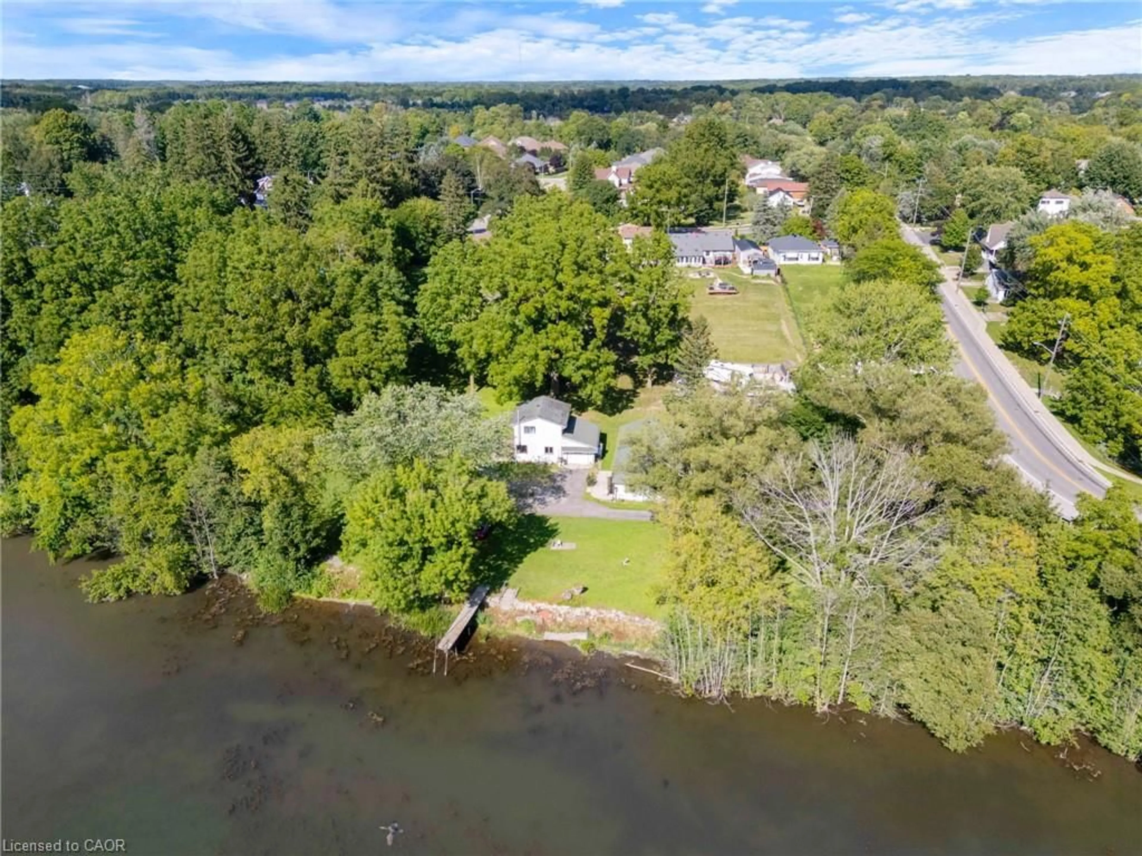 A pic from outside/outdoor area/front of a property/back of a property/a pic from drone, water/lake/river/ocean view for 1 Silver Lake Dr, Port Dover Ontario N0A 1N6