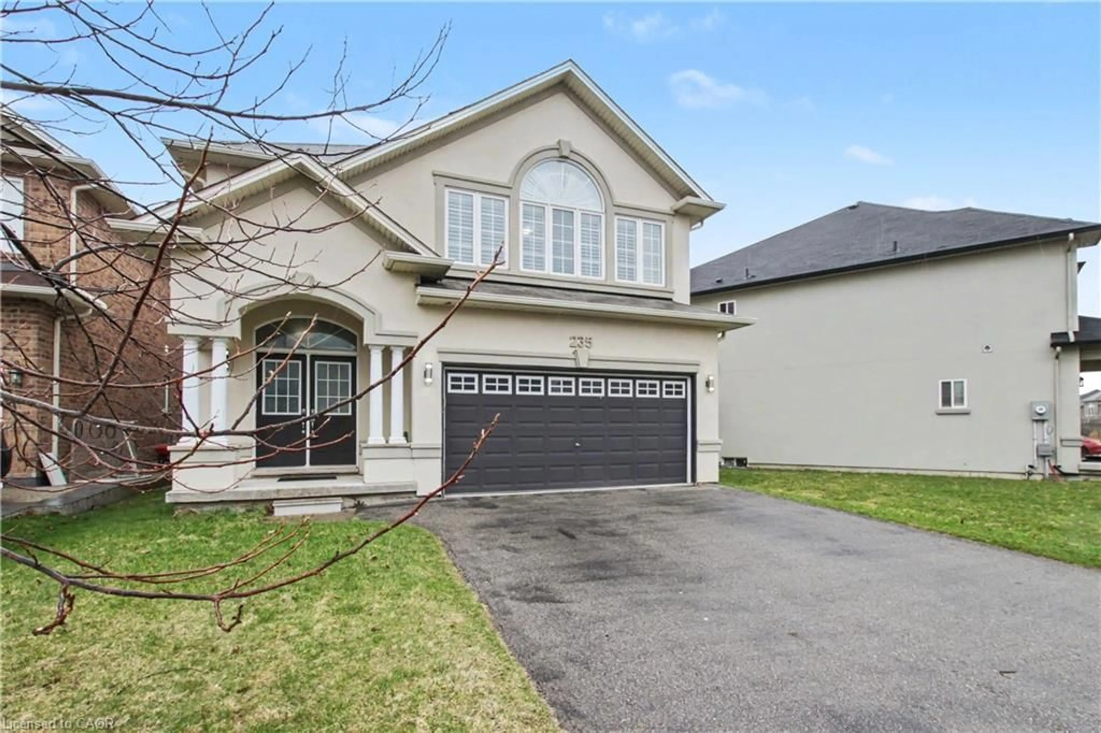 Home with vinyl exterior material, street for 235 Fair St, Ancaster Ontario L9K 0B9
