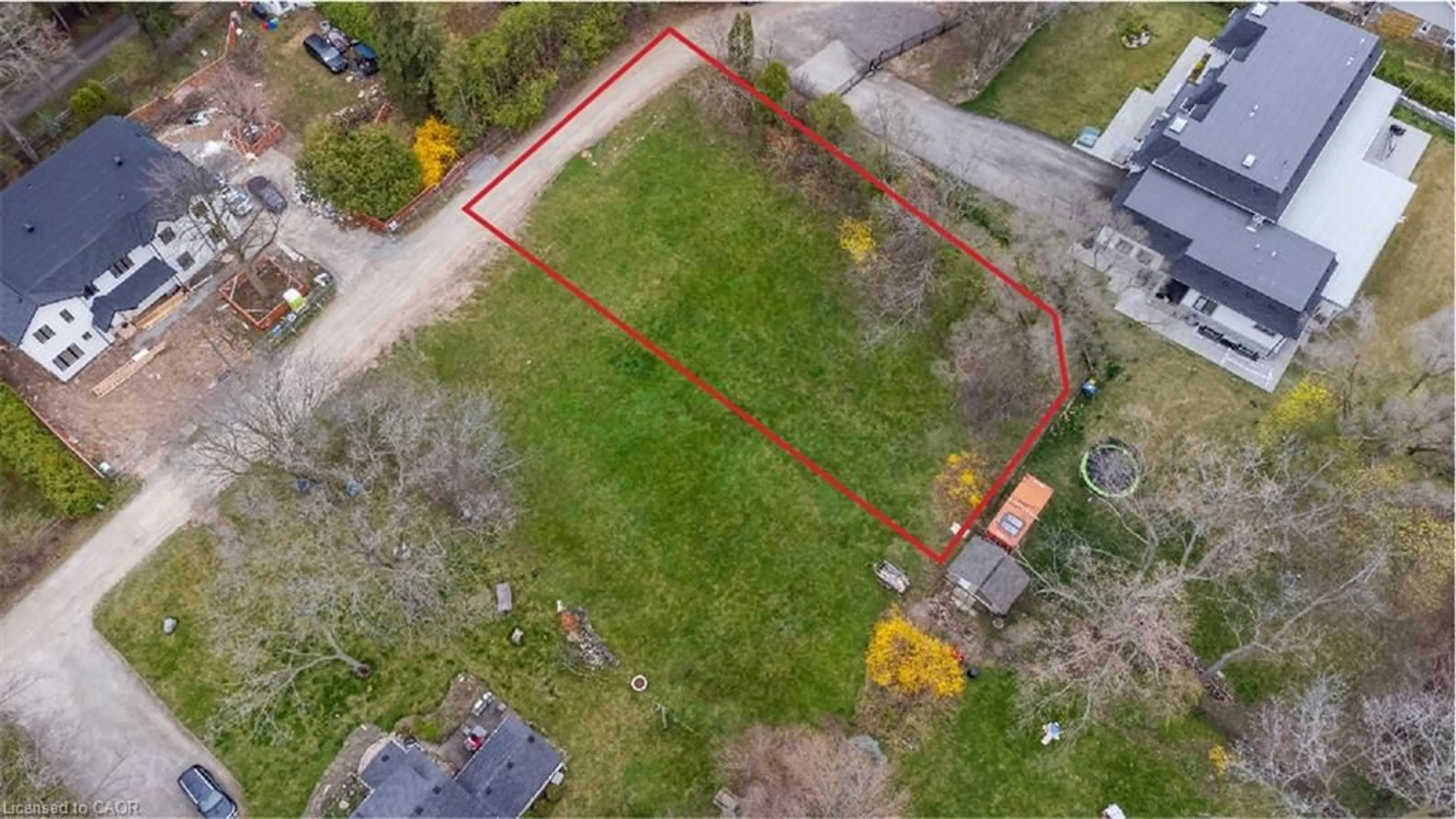 A pic from outside/outdoor area/front of a property/back of a property/a pic from drone, street for 1068 Sixth Line, Oakville Ontario L6H 1W5