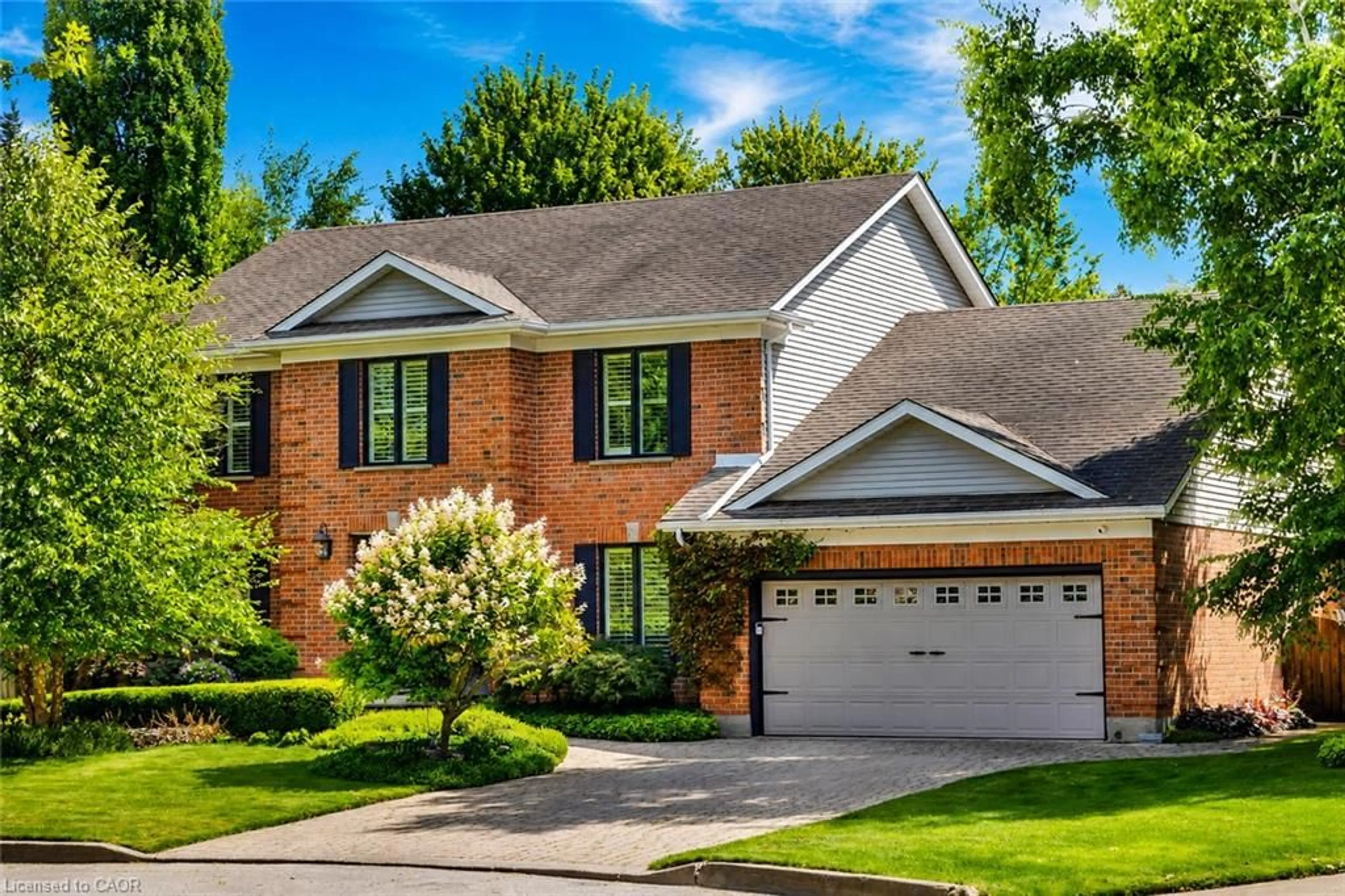 Home with brick exterior material, street for 559 Strathmere Crt, Waterloo Ontario N2T 2K2
