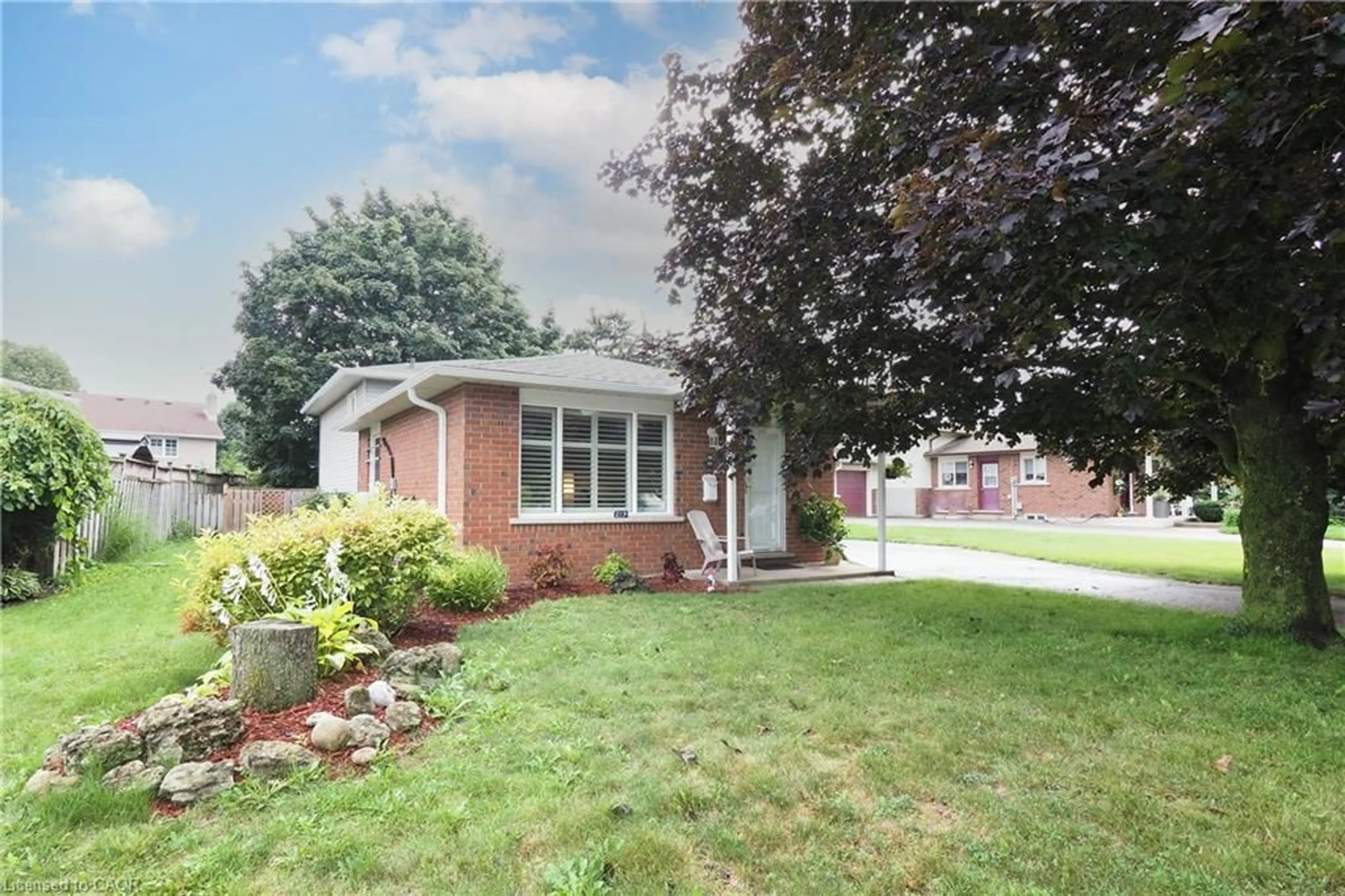 Home with brick exterior material, street for 219 Foxhunt Rd, Waterloo Ontario N2K 2R8