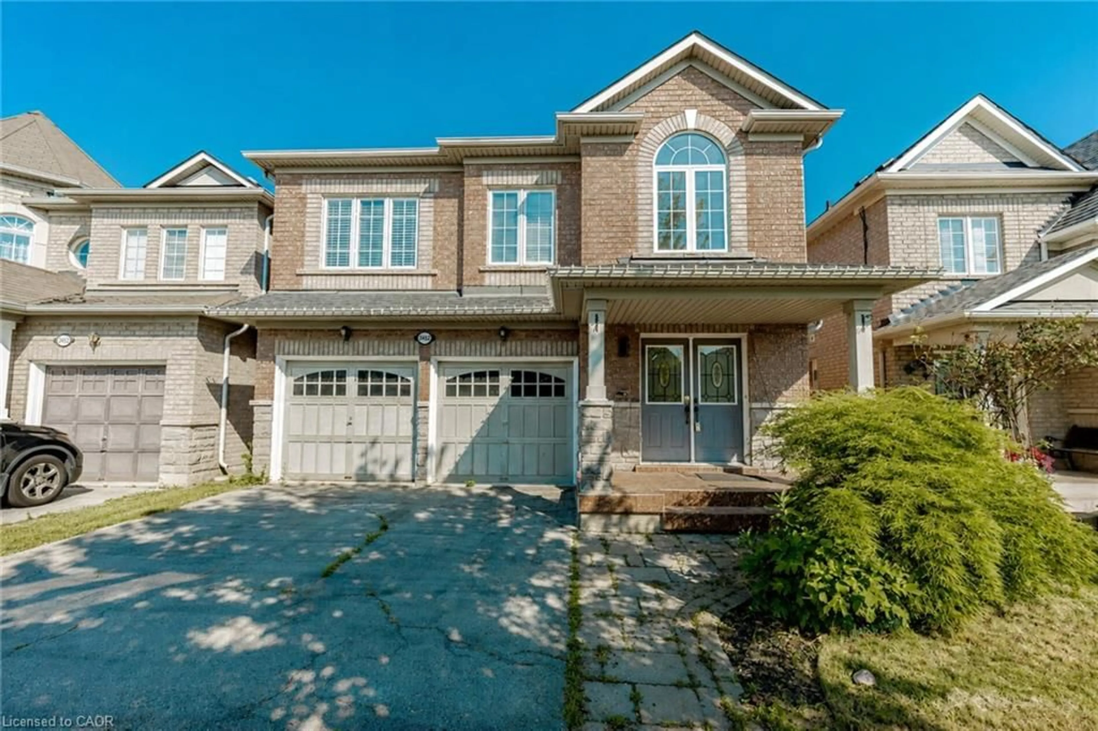 Home with brick exterior material, street for 2452 Pathfinder Dr, Burlington Ontario L7L 6X9