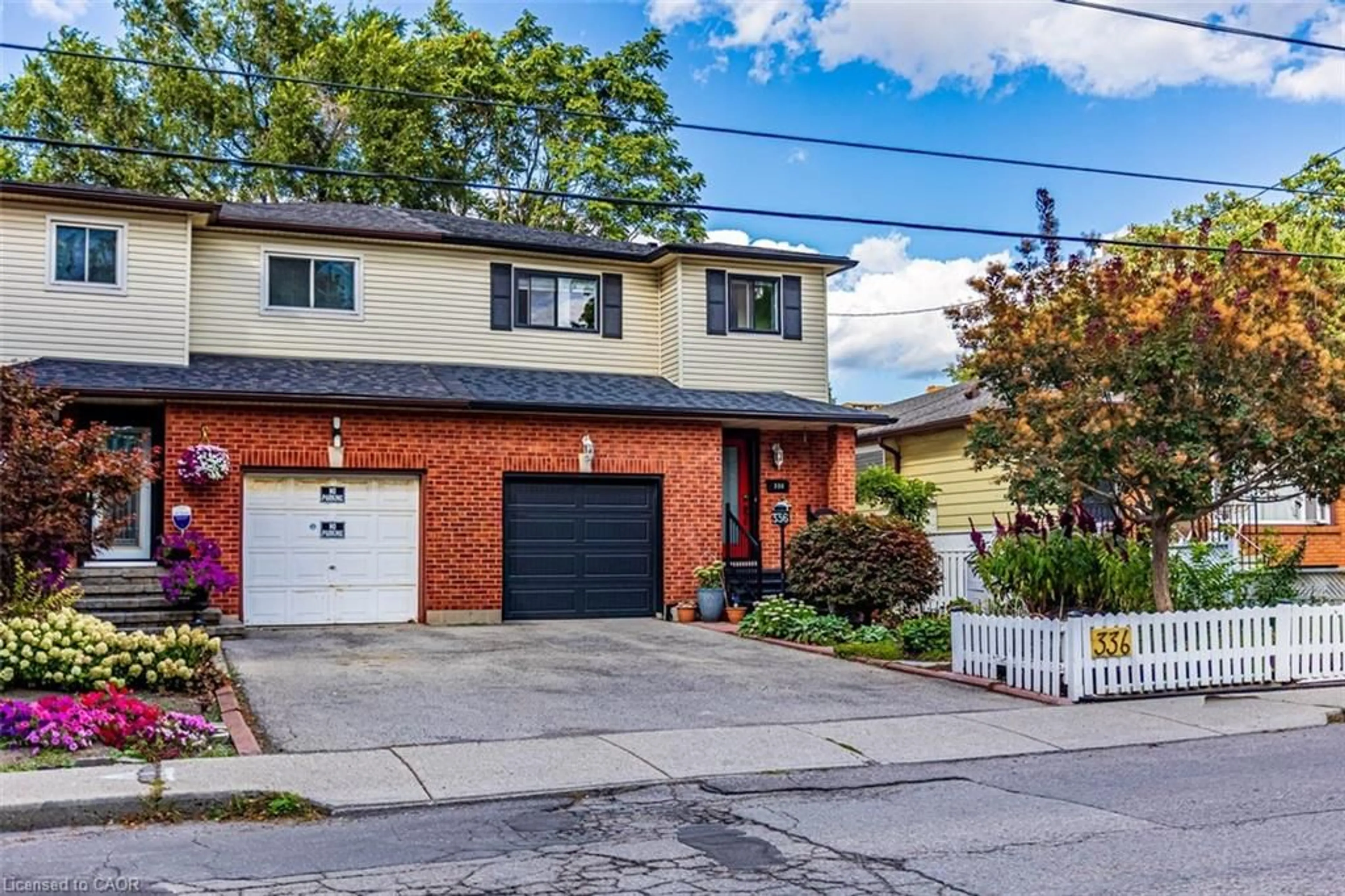 Home with brick exterior material, street for 336 Jackson St, Hamilton Ontario L8P 1M8