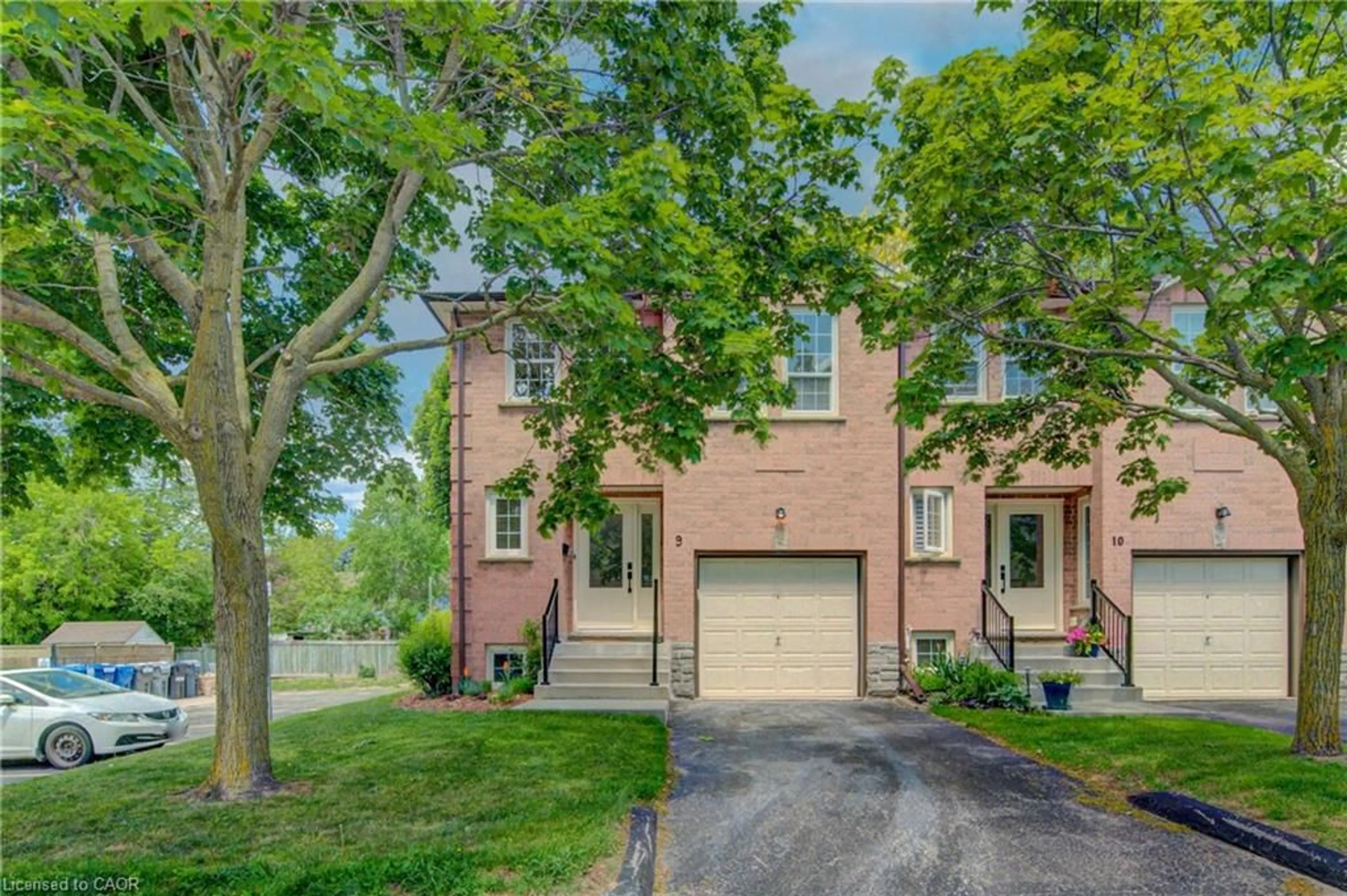 Home with brick exterior material, street for 375 Holiday Inn Dr #9, Cambridge Ontario N3C 3P6