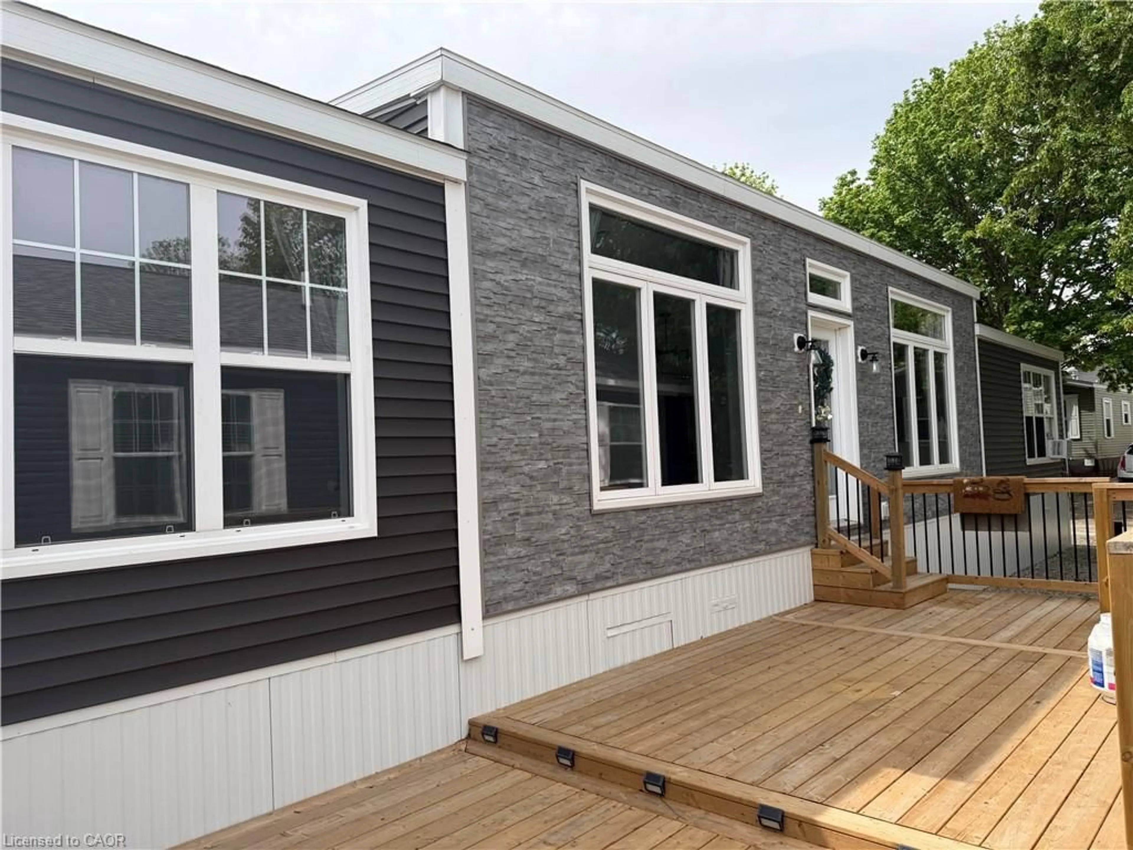Home with vinyl exterior material, building for 99 Fourth Concession Rd #617, Burford Ontario N0E 1A0